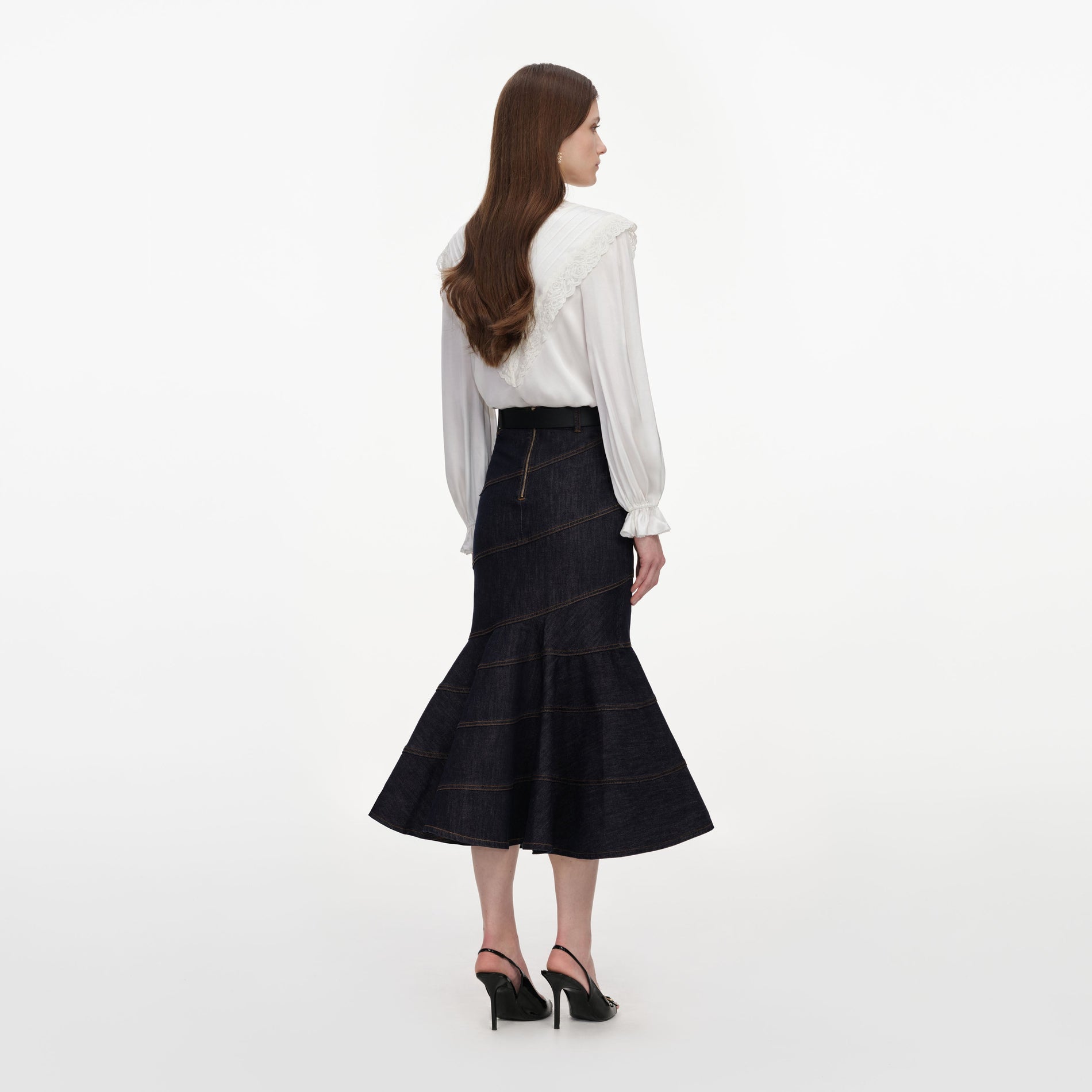 Back view of a woman wearing the Cream Viscose Lace Top