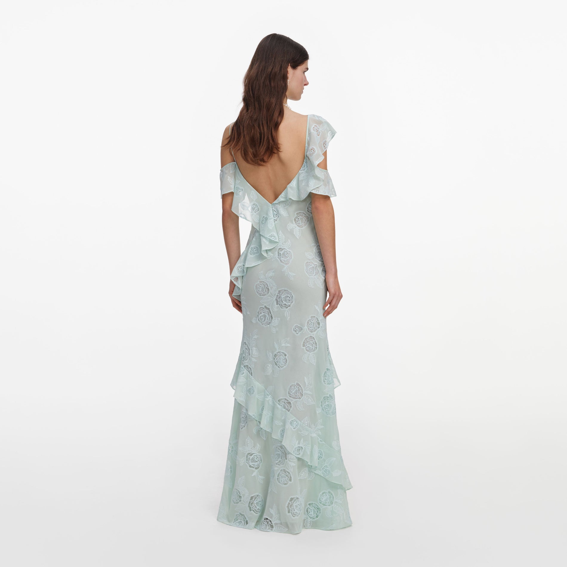 Back view of a woman wearing the Mint Embroidered Georgette Maxi Dress