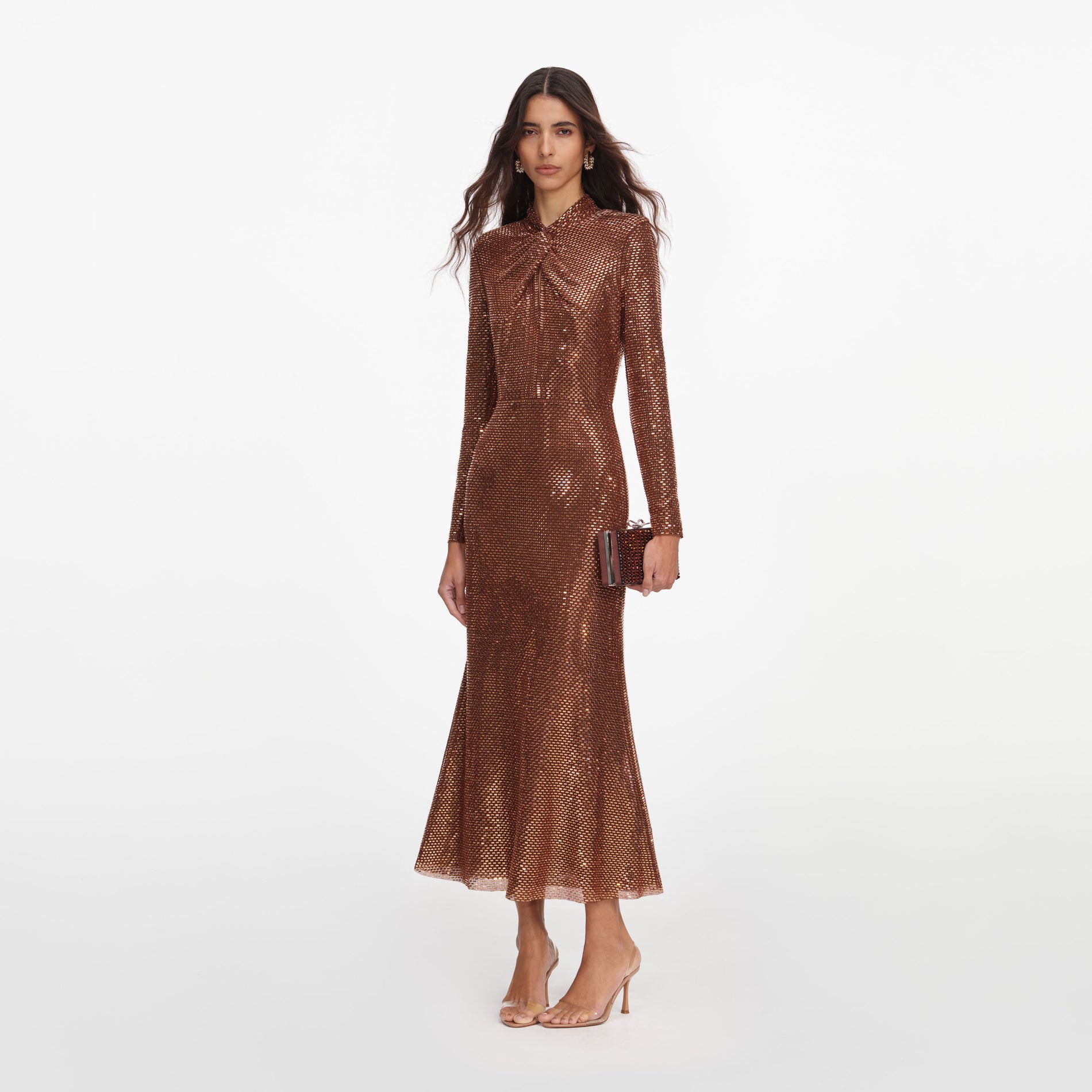 Side view of a woman wearing the Bronze Rhinestone Midi Dress