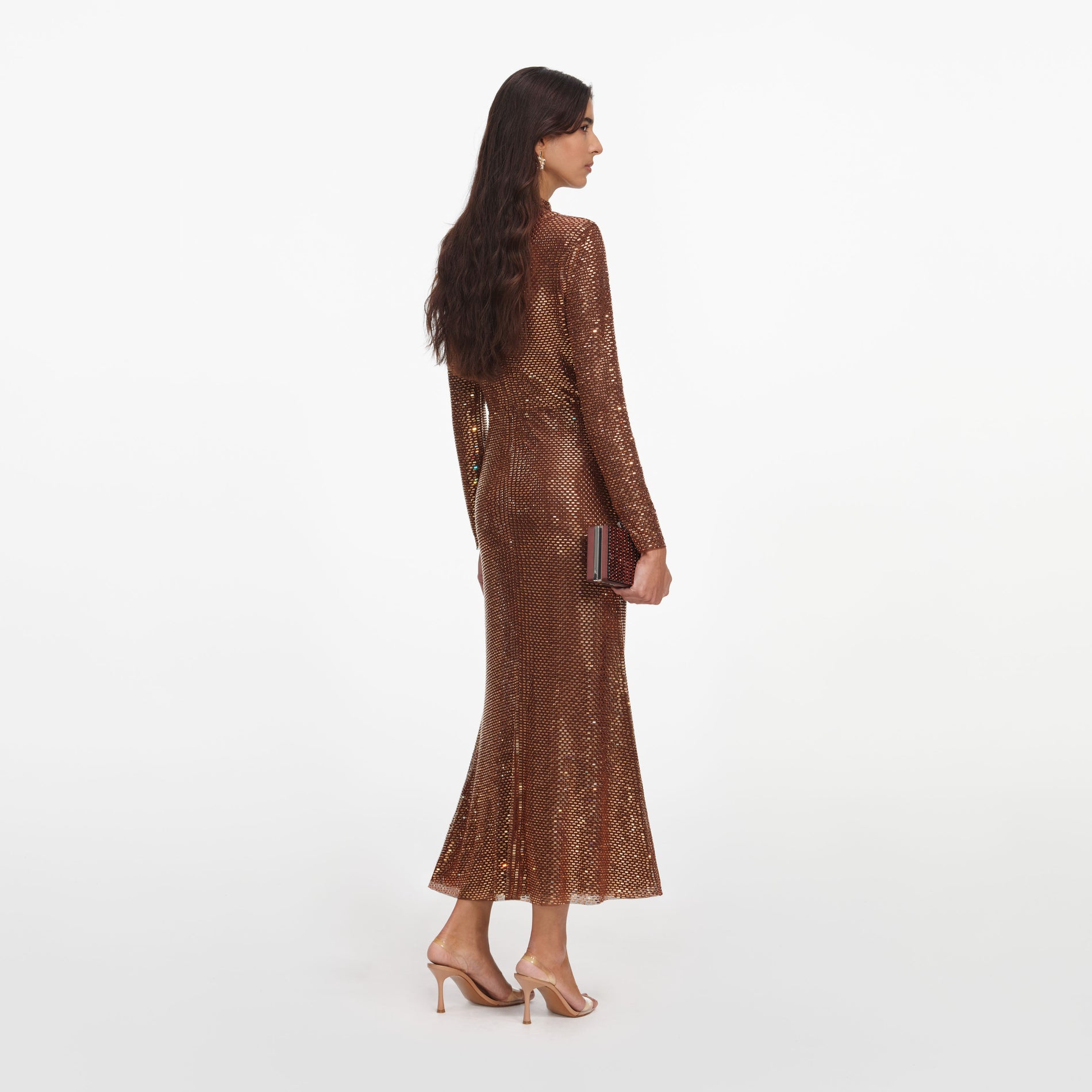 Back view of a woman wearing the Bronze Rhinestone Midi Dress