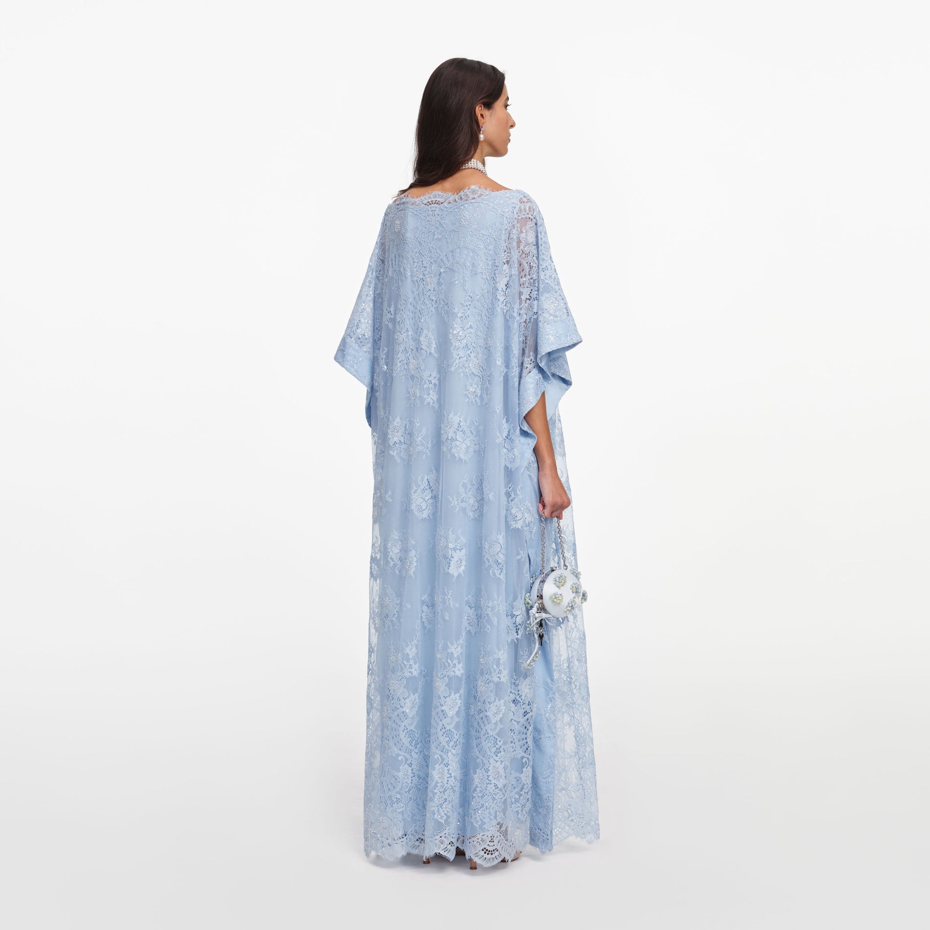 Back view of a woman wearing the Blue Embellished Lace Kaftan