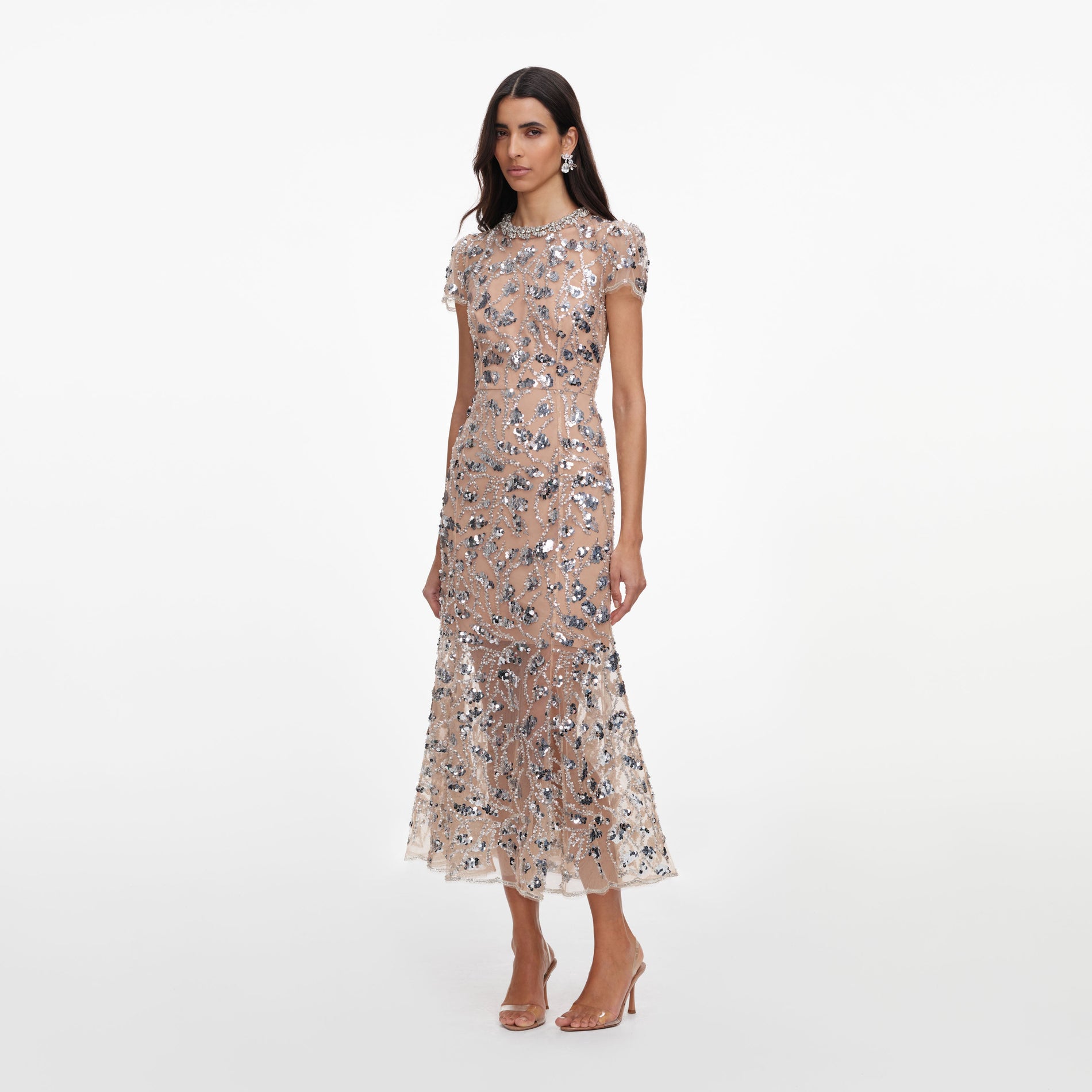 Side view of a woman wearing the Silver Sequin Embellished Midi Dress