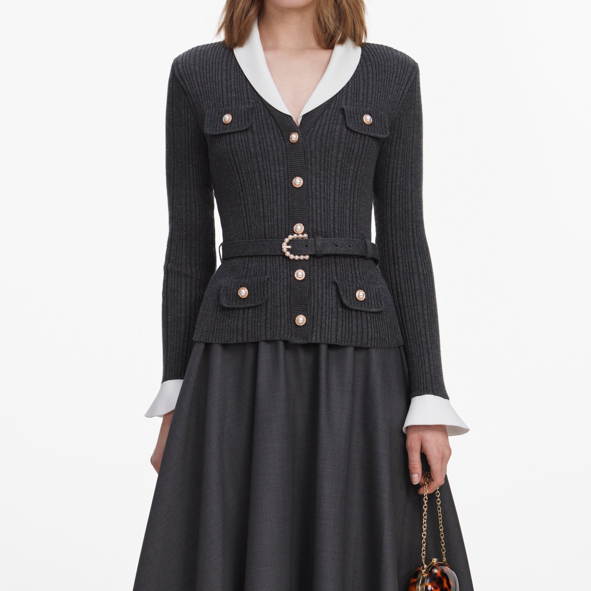 A close up of a woman wearing the Grey Knit Twill Midi Dress