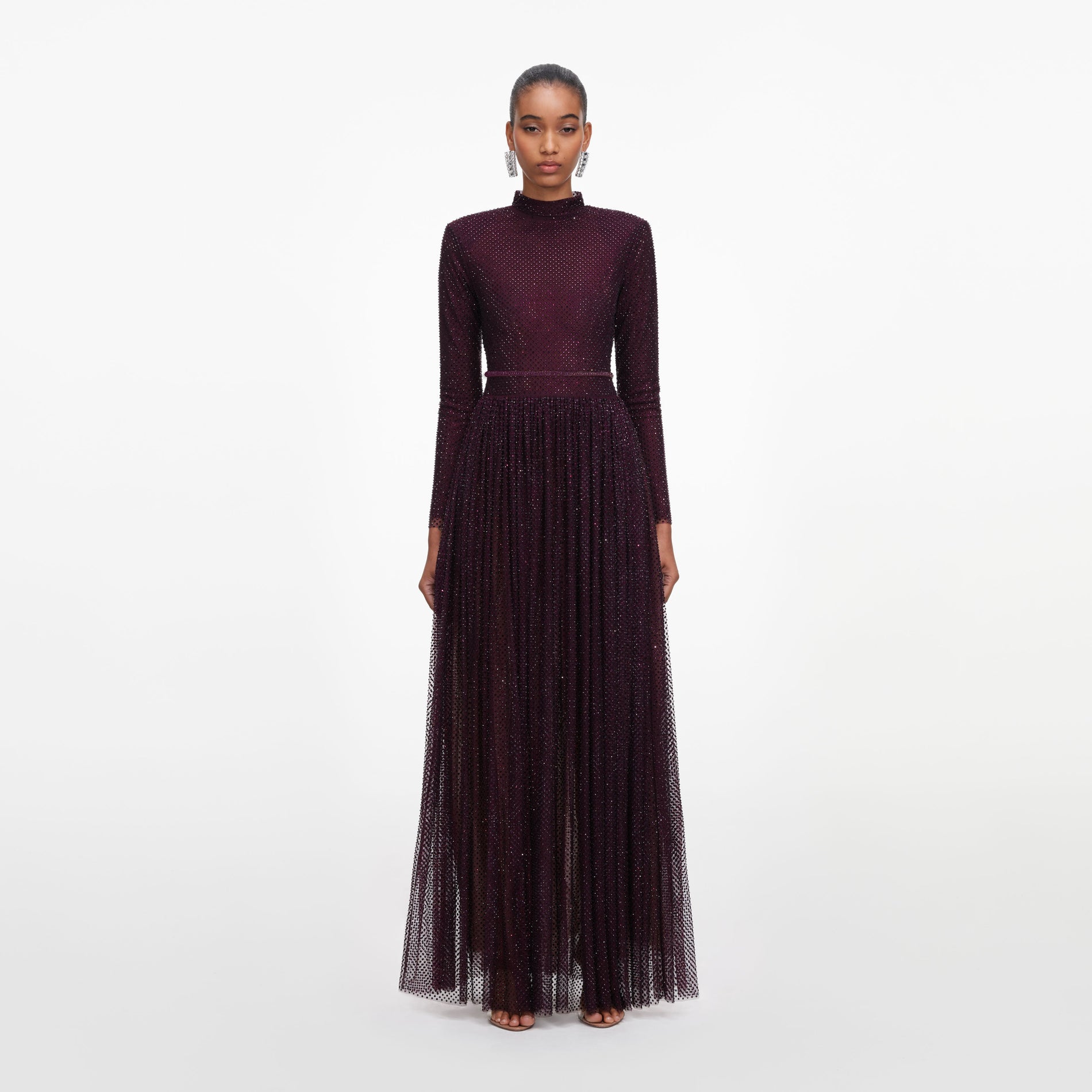 Front view of a woman wearing the Burgundy Rhinestone Long Sleeve Maxi Dress