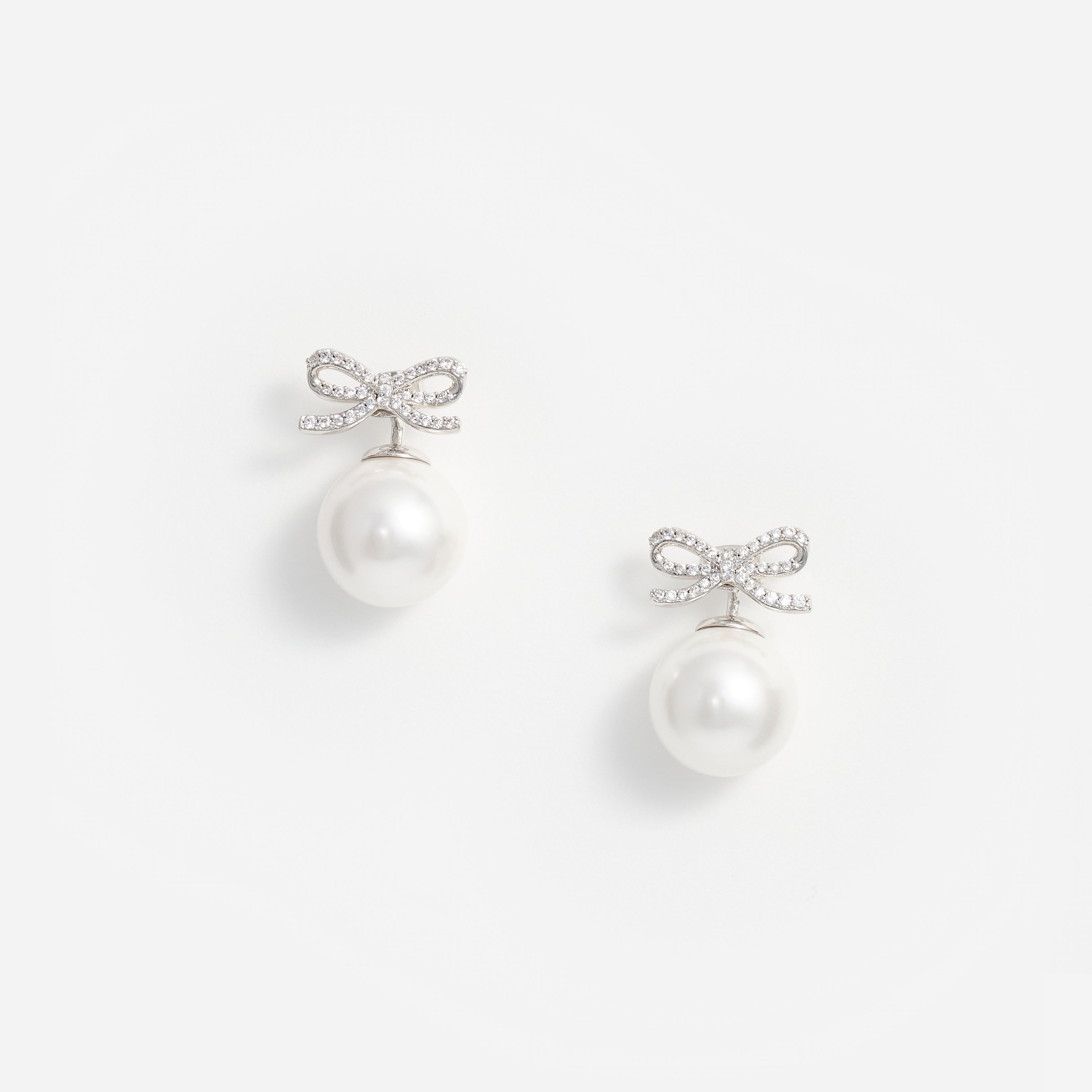 Crystal Bow Pearl Back Earrings