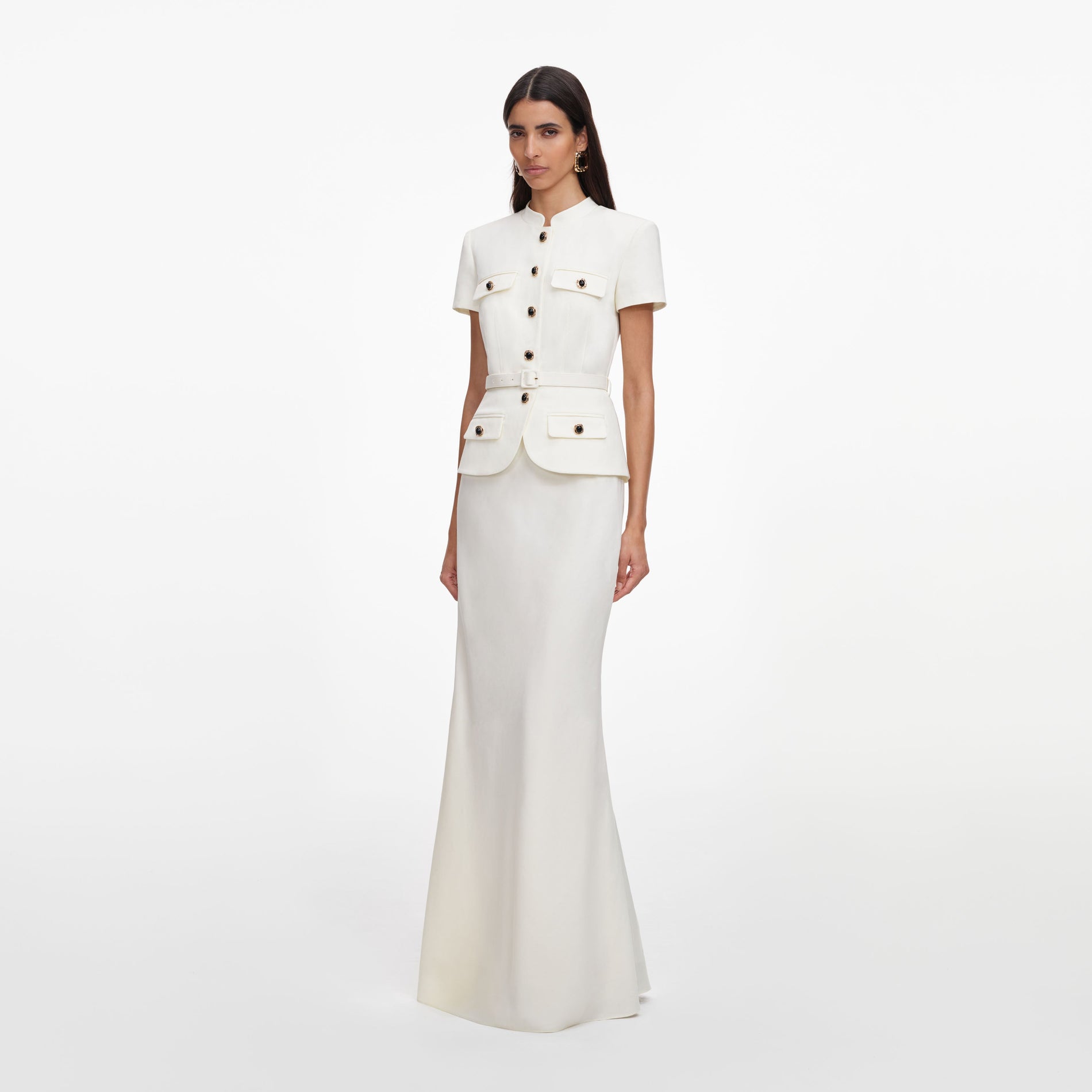 Side view of a woman wearing the Cream Linen Blend Peplum Maxi Dress