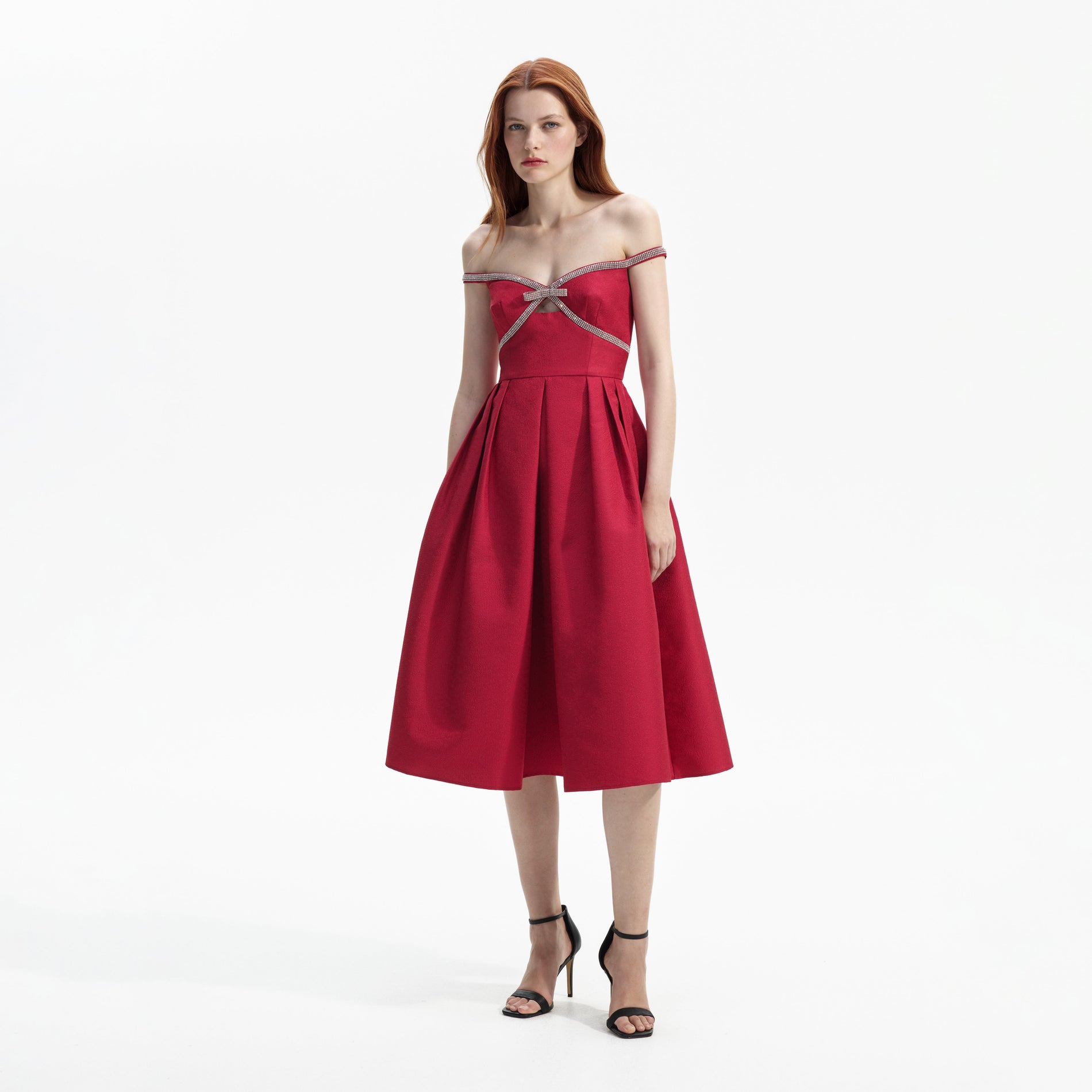 Side view of a woman wearing the Red Textured Diamante Midi Dress