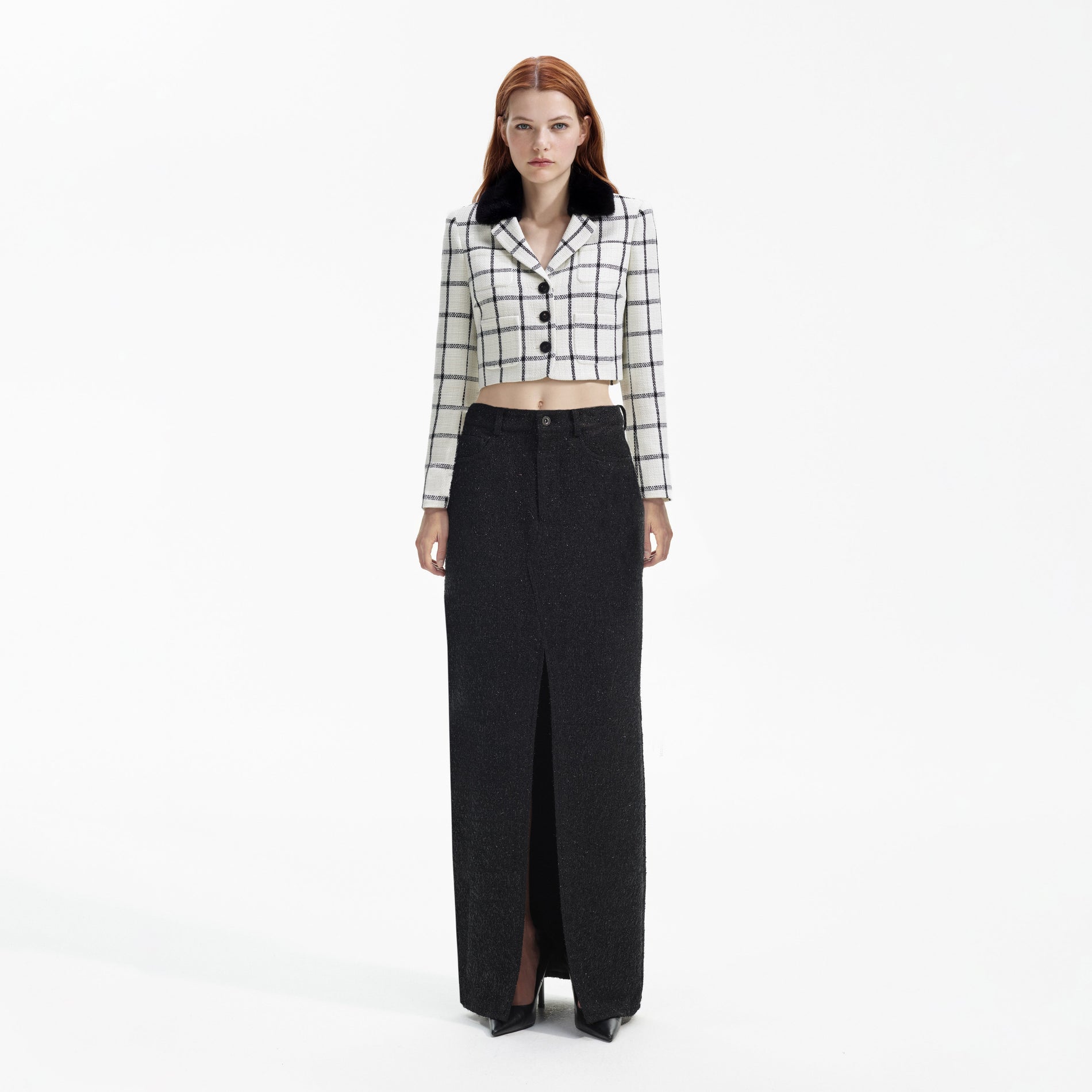 Front view of a woman wearing the Cream Check Jacket