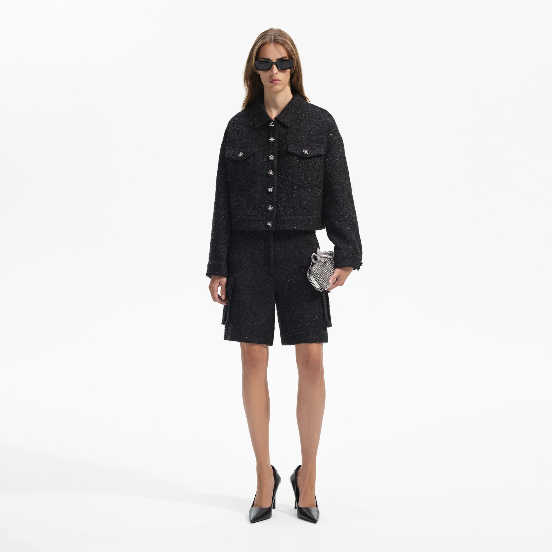 Front view of a woman wearing the Black Boucle Oversized Jacket