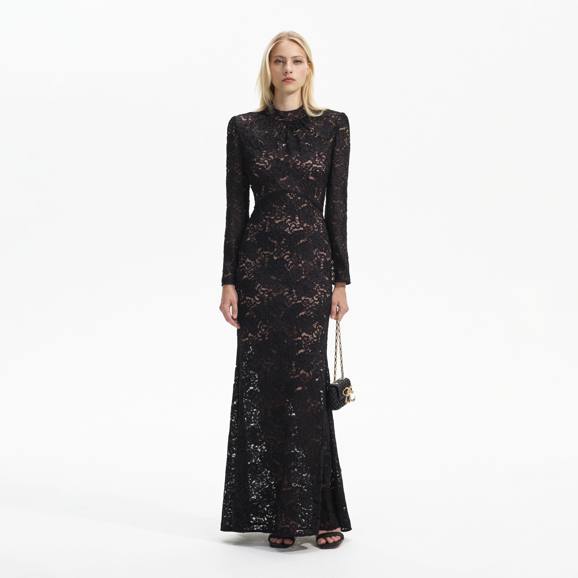 Front view of a woman wearing the Black Cord Lace Maxi Dress