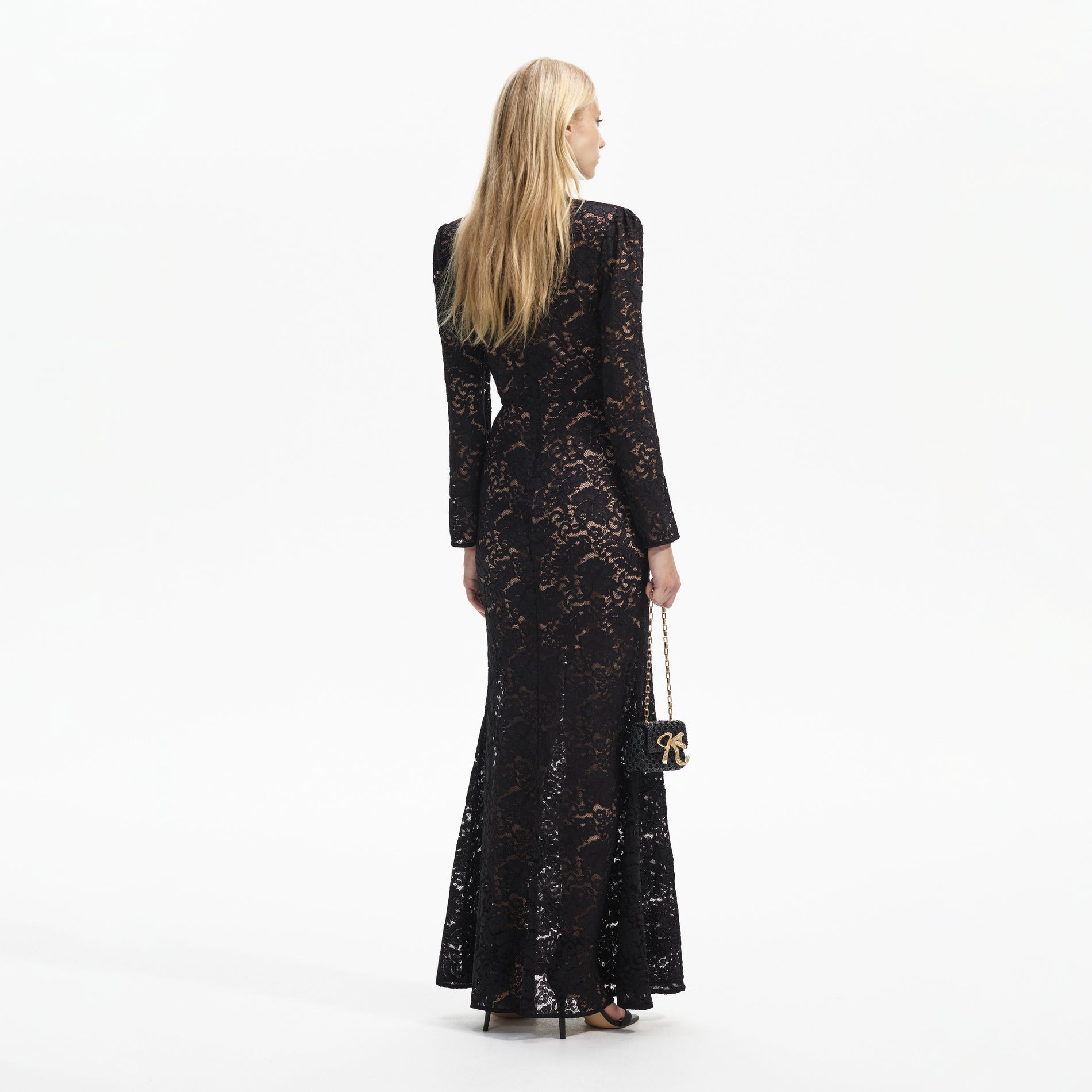 Back view of a woman wearing the Black Cord Lace Maxi Dress