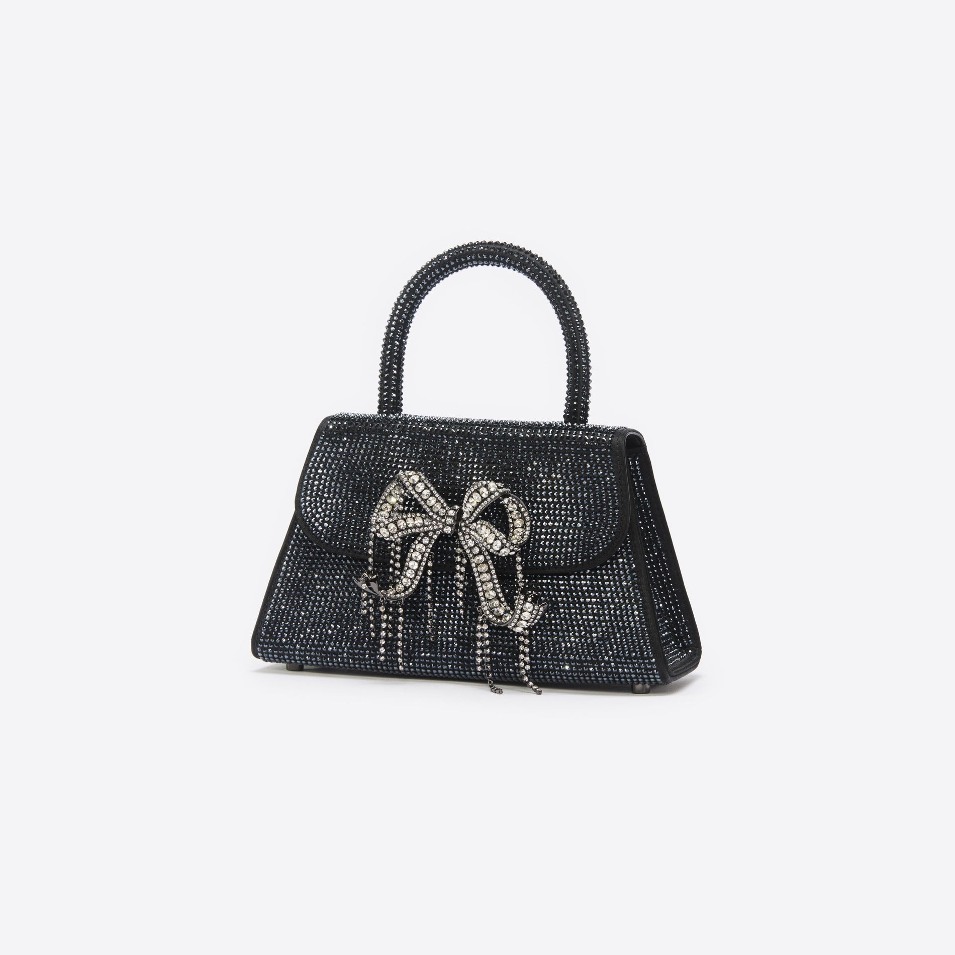 Side view of a woman wearing the Black Rhinestone Mini Bow Bag