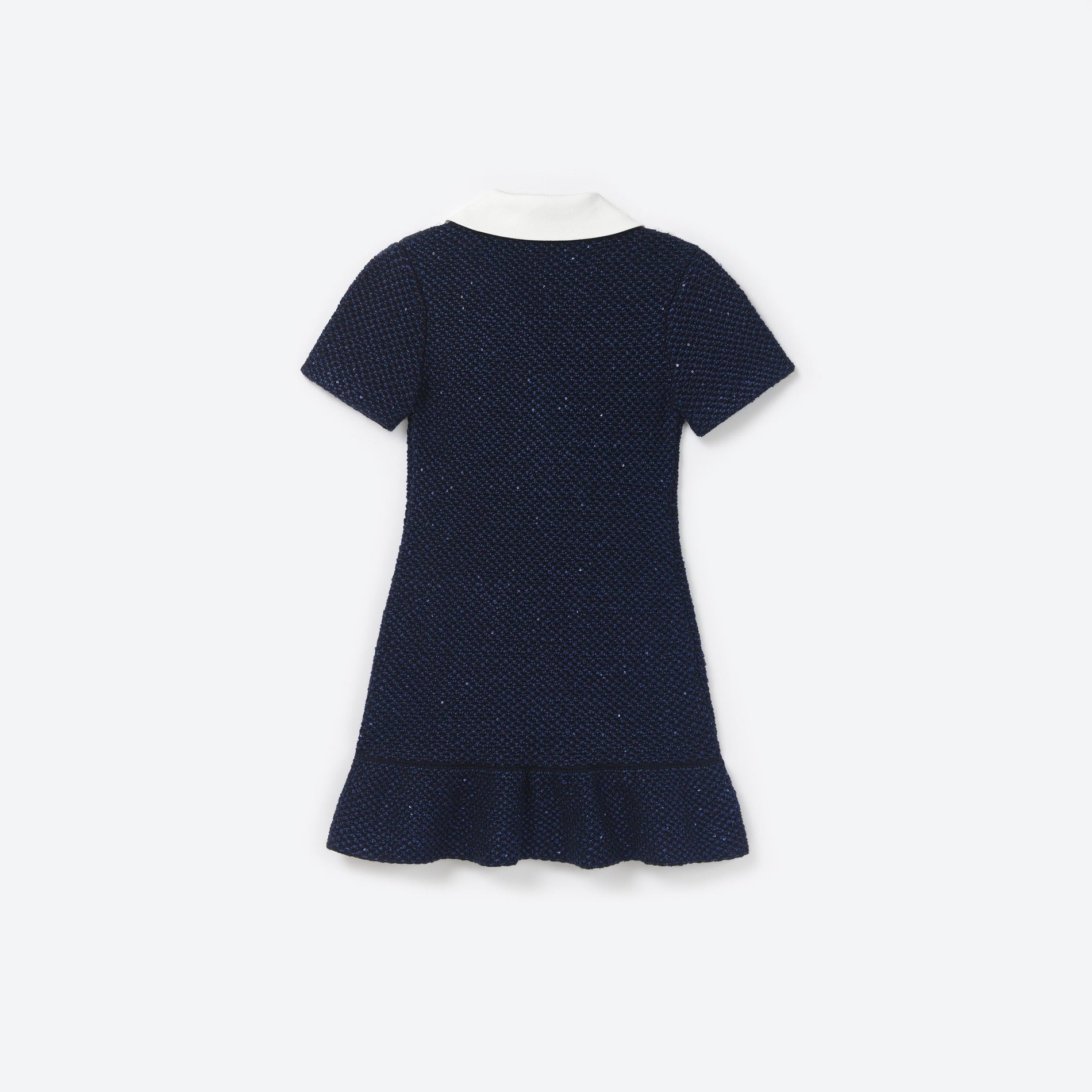 Side view of a woman wearing the Blue Sequin Knit Bow Dress