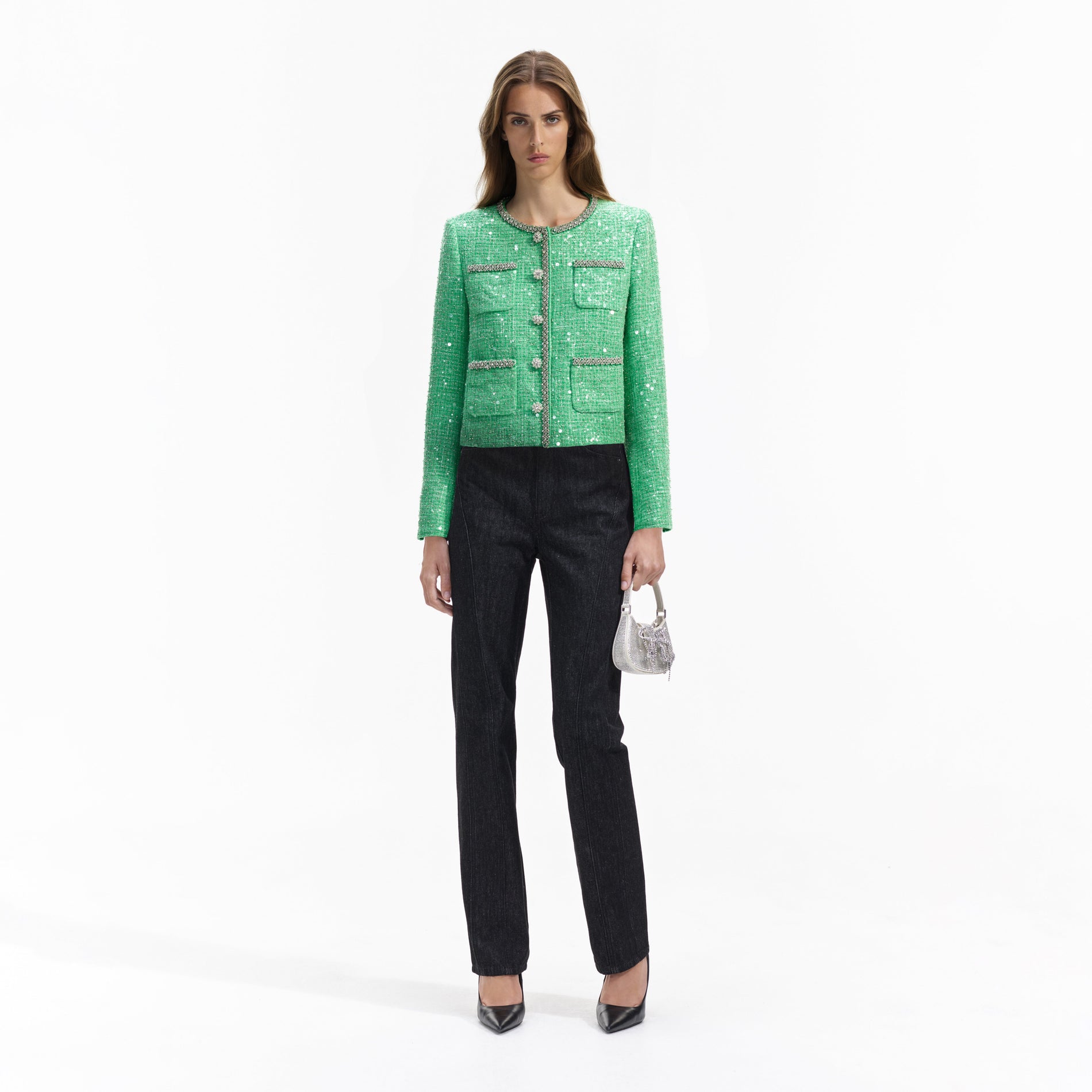 Front view of a woman wearing the Green Boucle Jacket