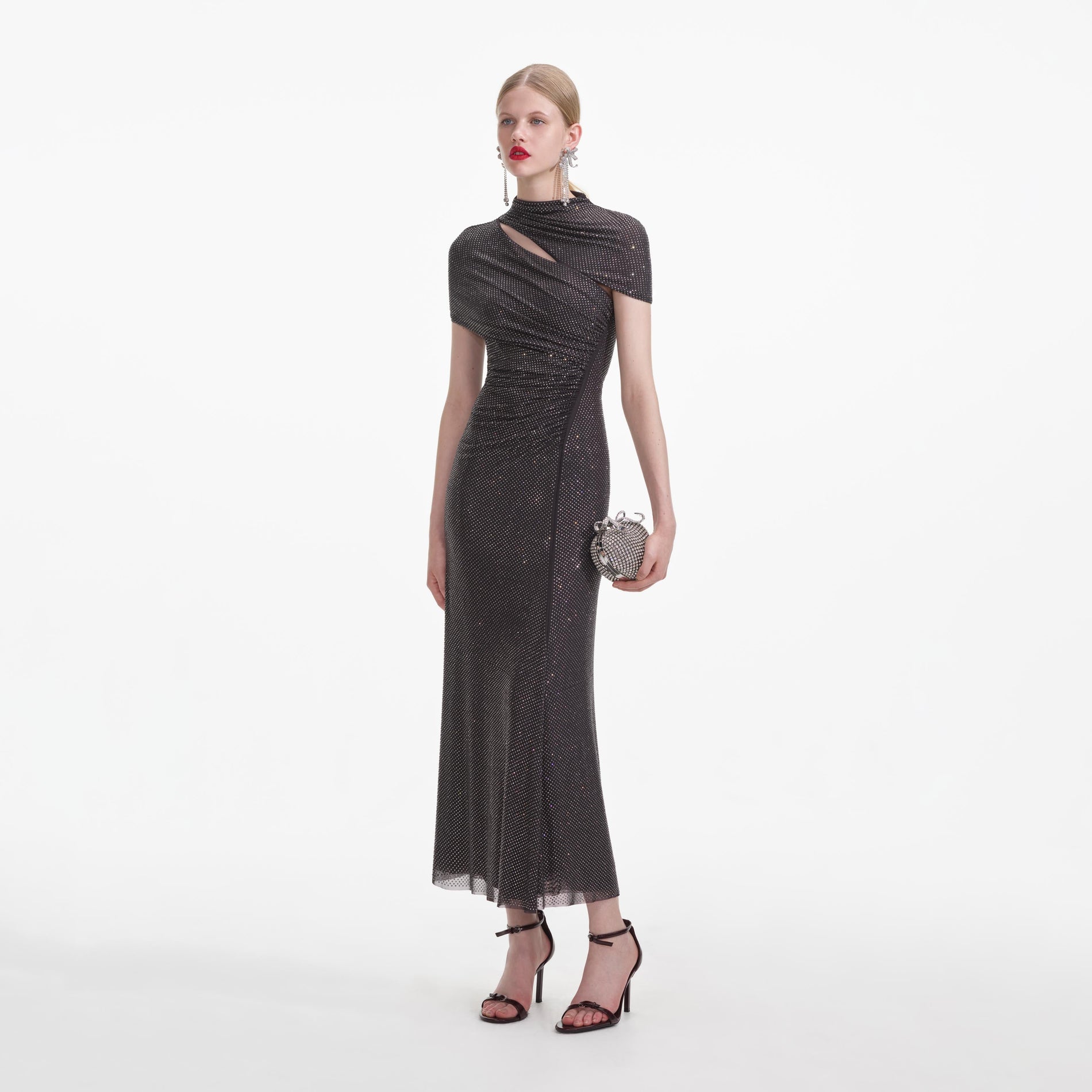 Side view of a woman wearing the Slate Rhinestone Mesh Cut Out Midi Dress