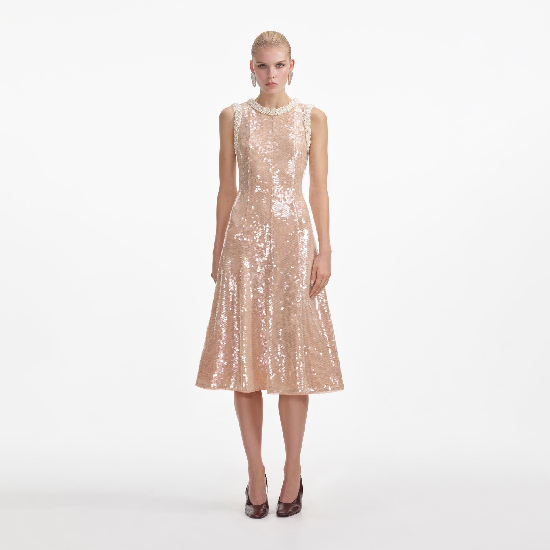 Front view of a woman wearing the Sequin Pearl Trim Midi Dress