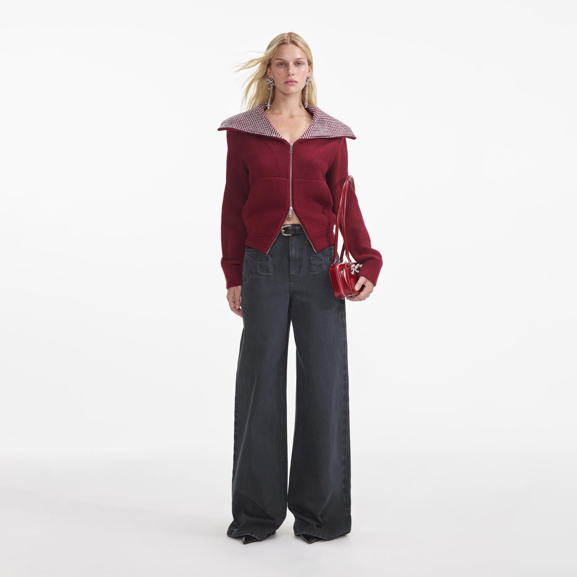 Front view of a woman wearing the Burgundy Diamante Collar Knit Jacket