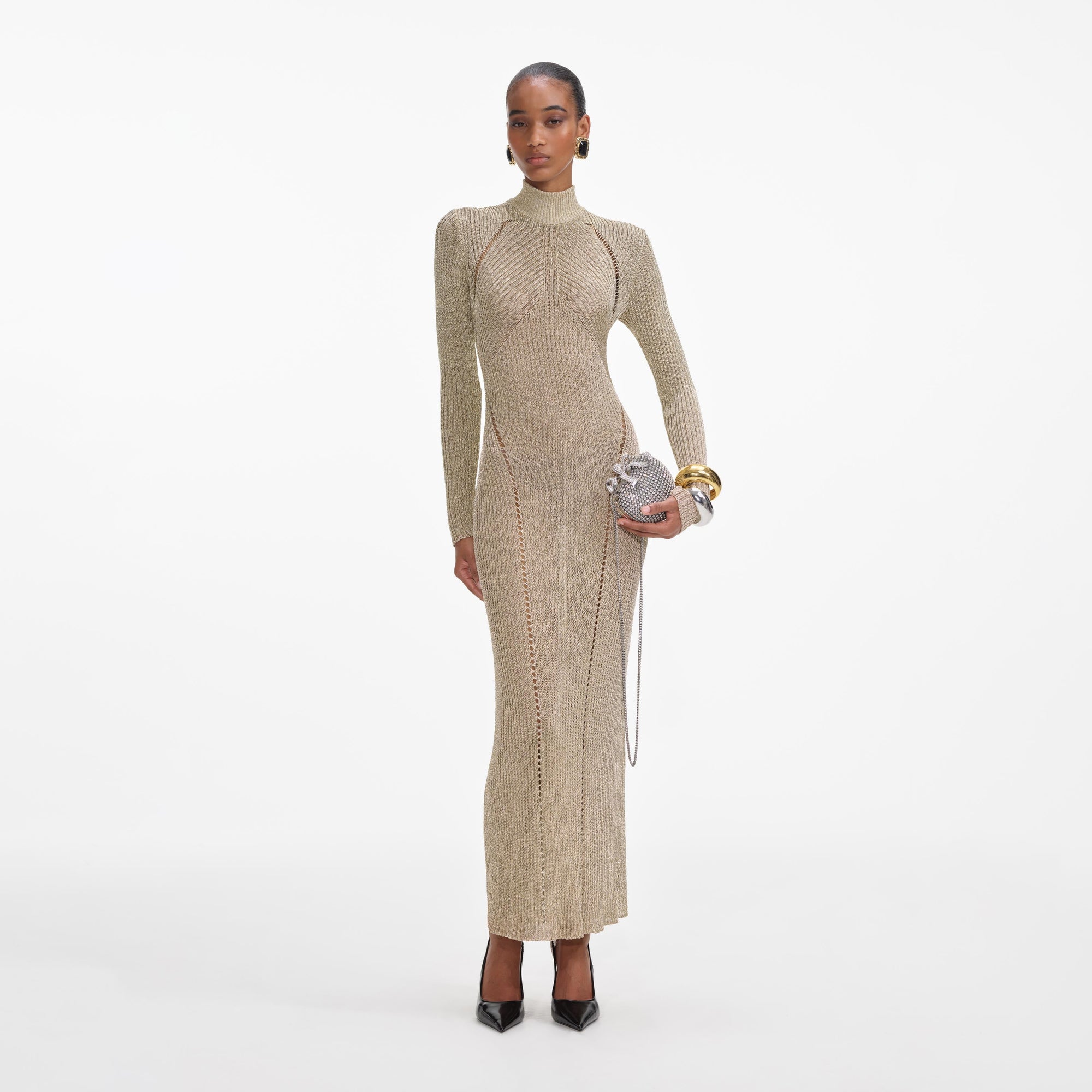 Front view of a woman wearing the Gold Lurex Knit Maxi Dress