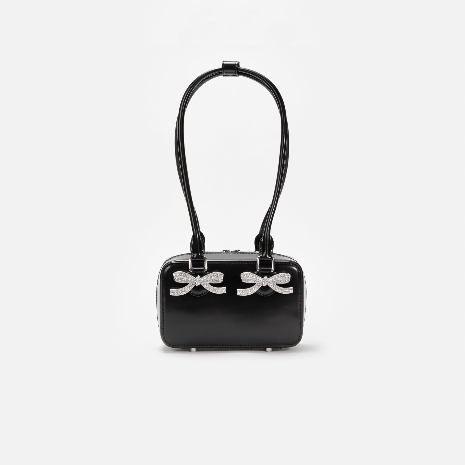 Front view of a woman wearing the Black Leather Shoulder Bag