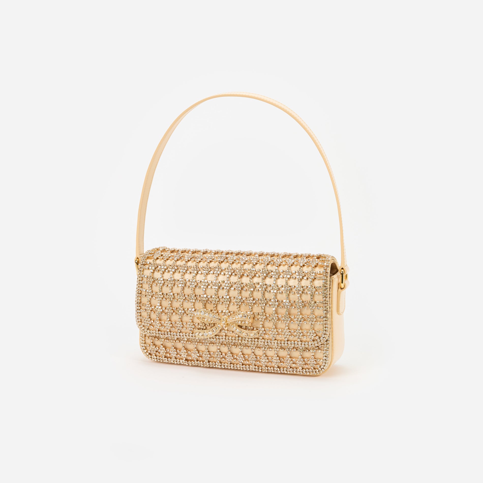 Side view of a woman wearing the Gold Crystal Baguette Bag