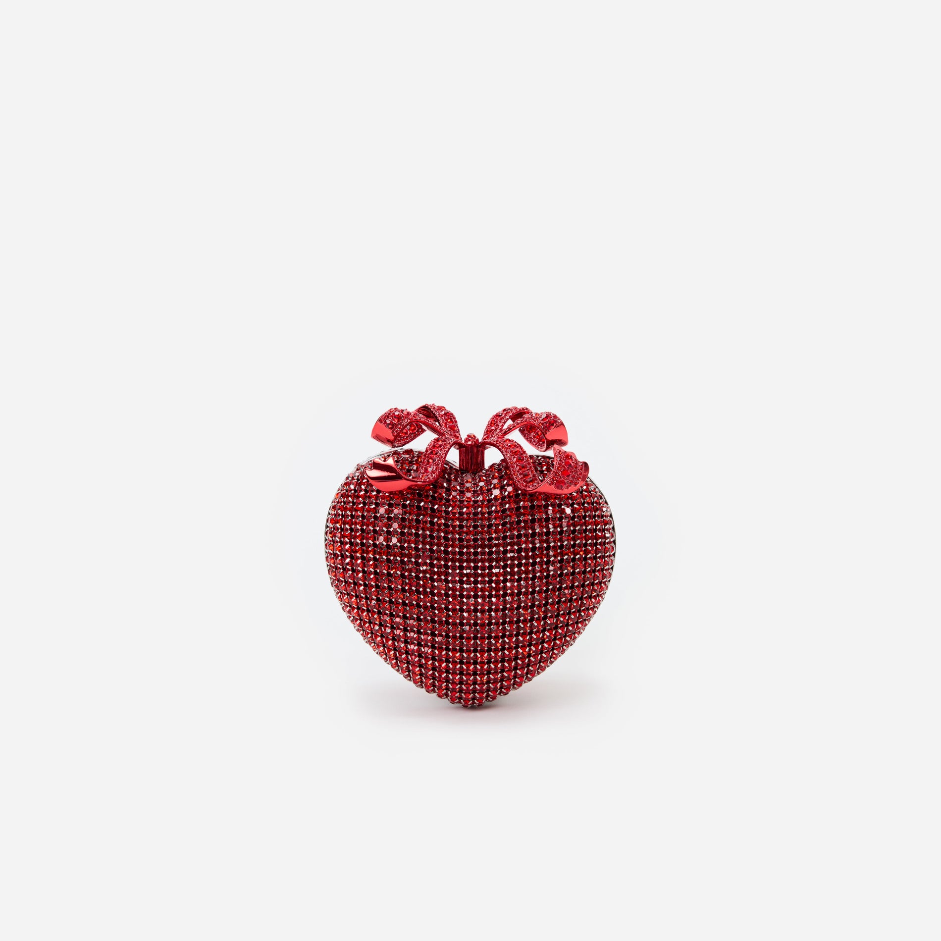 Red heart-shaped ornament with a bow on top, covered in small, sparkling red rhinestones