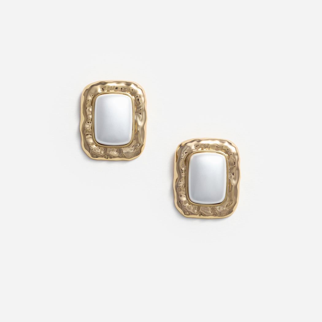 Front view of a woman wearing the Mottled Gold Pearl Earrings