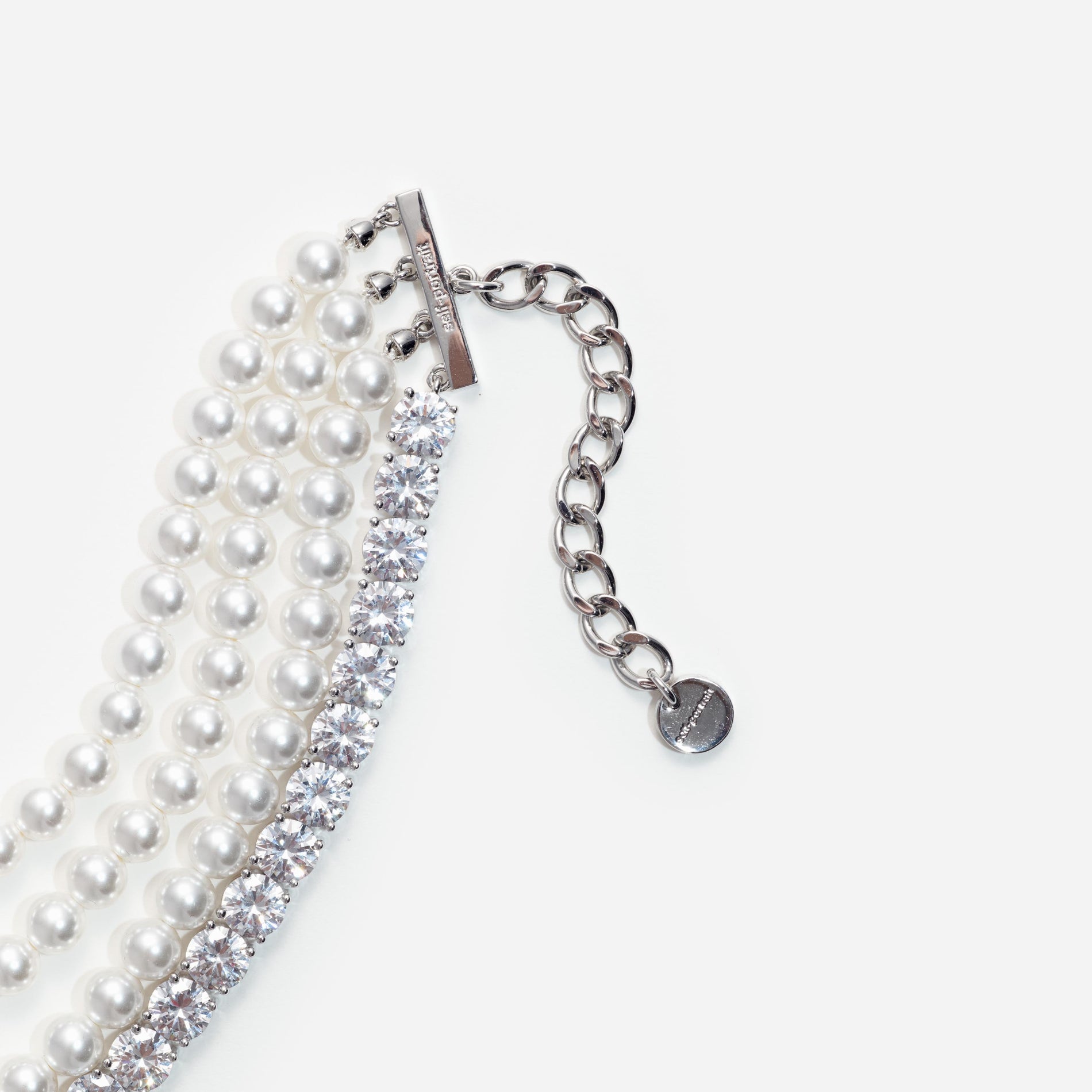 Side view of a woman wearing the Pearl Diamante Bracelet