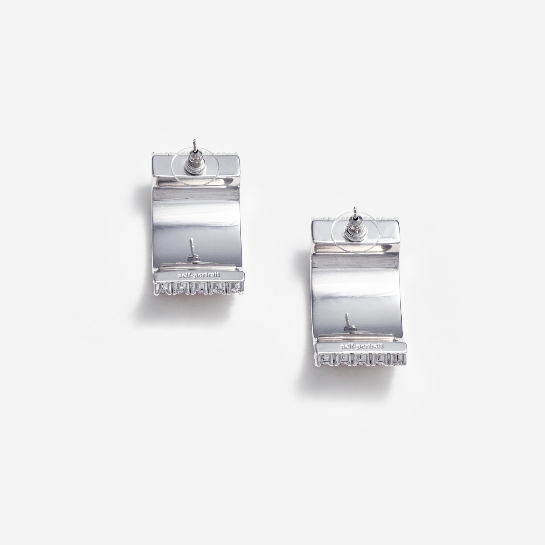 Side view of a woman wearing the Crystal Chainmail Earrings