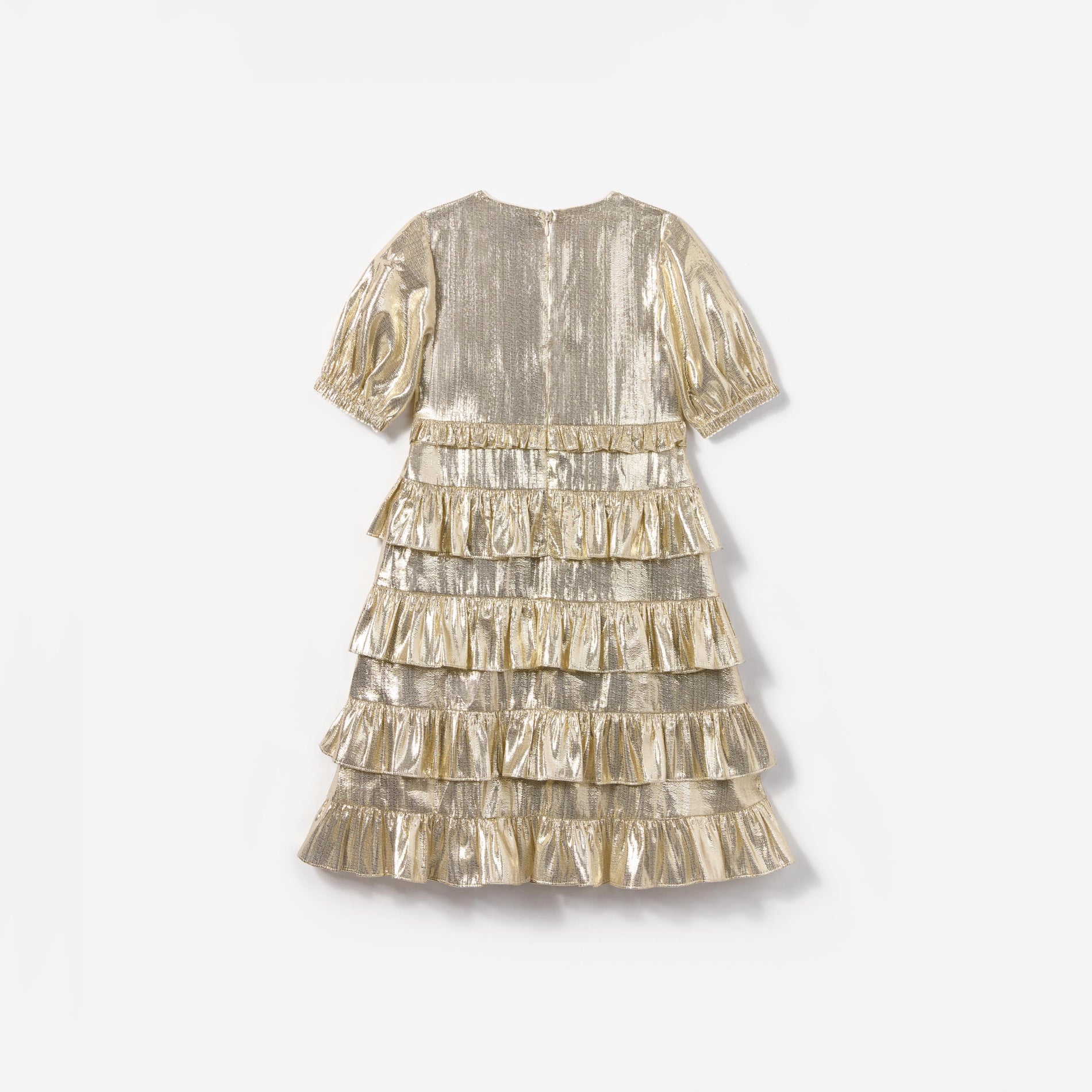 Side view of a woman wearing the Gold Metallic Frill Dress