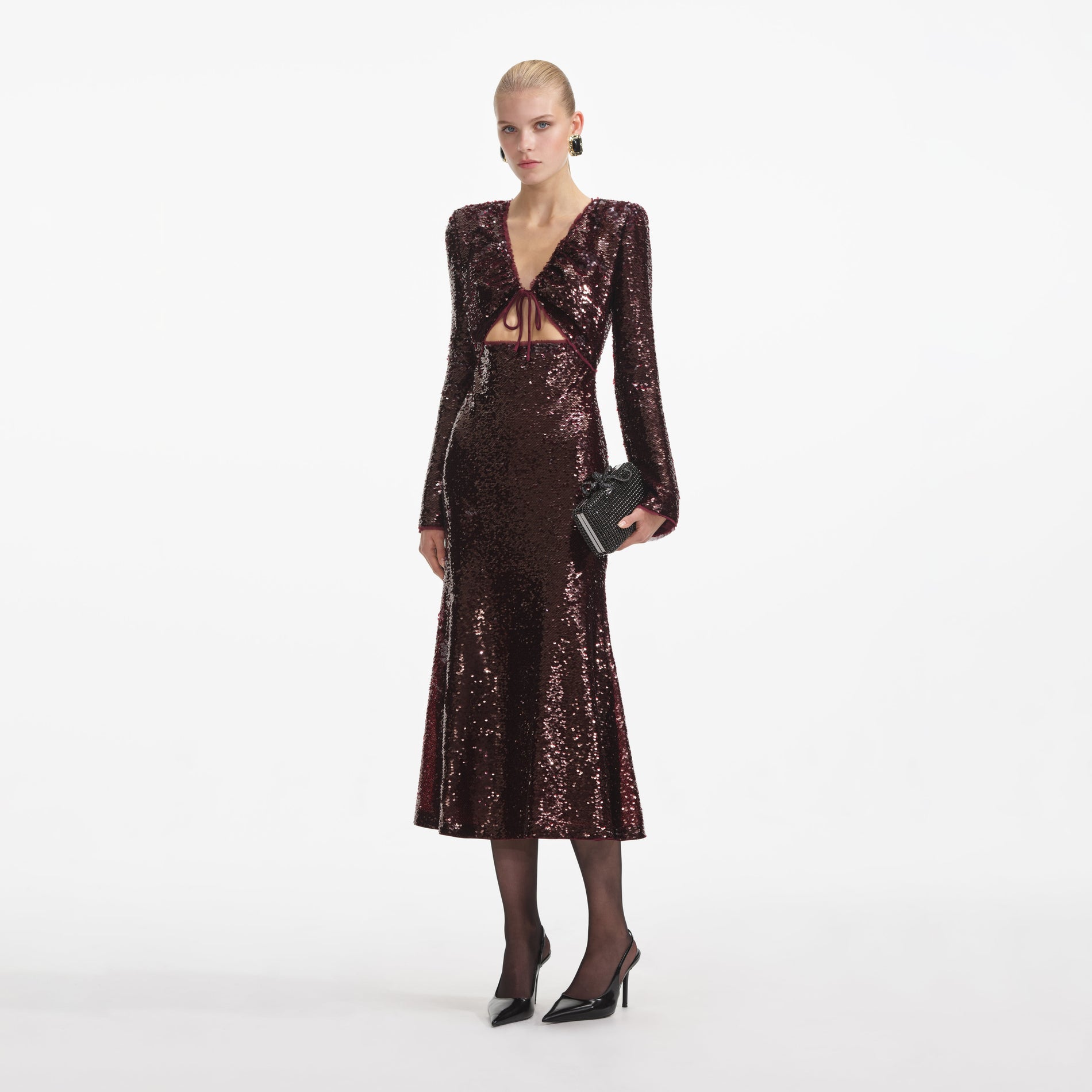 Side view of a woman wearing the Burgundy Sequin Midi Dress