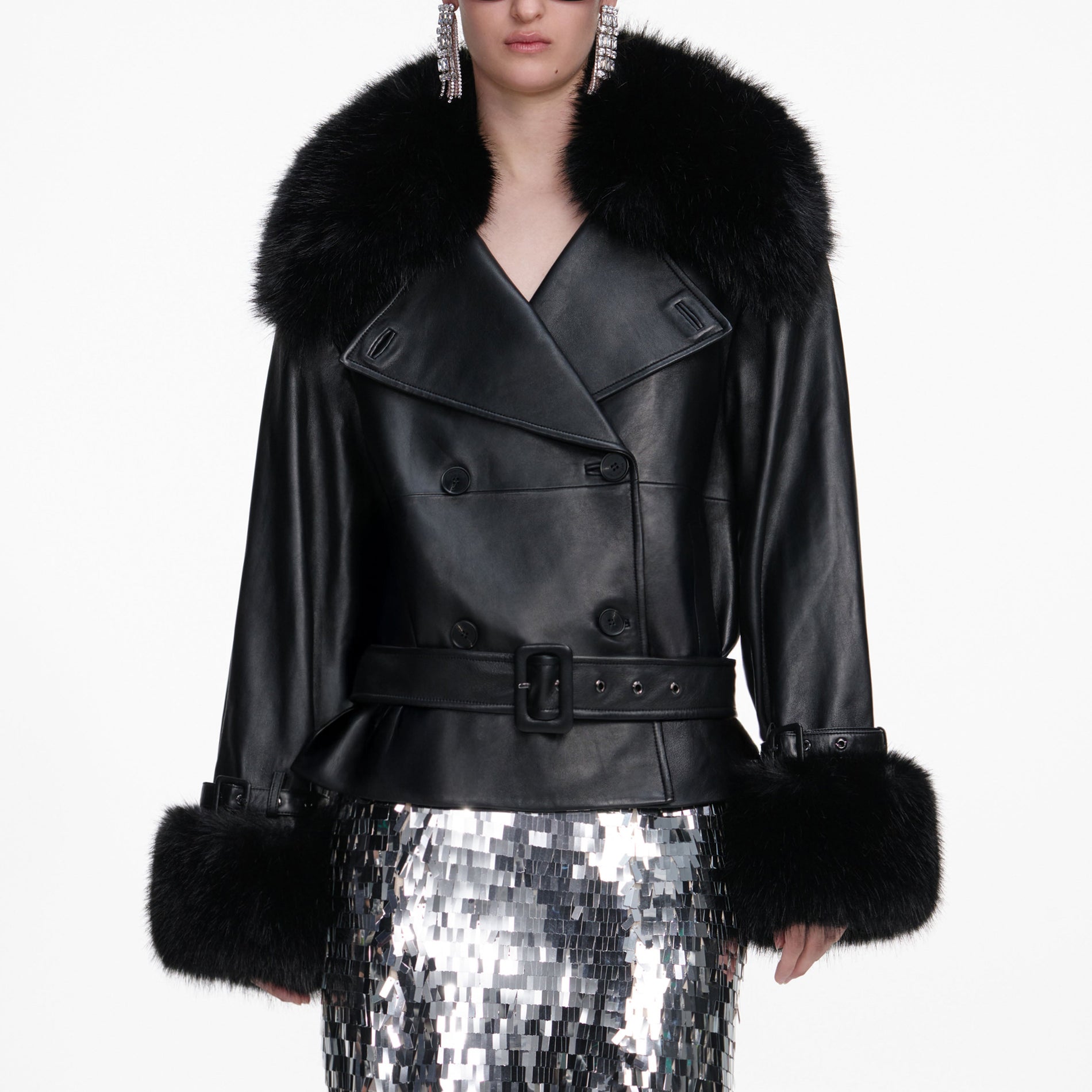 A close up of a woman wearing the Black Belted Leather Jacket