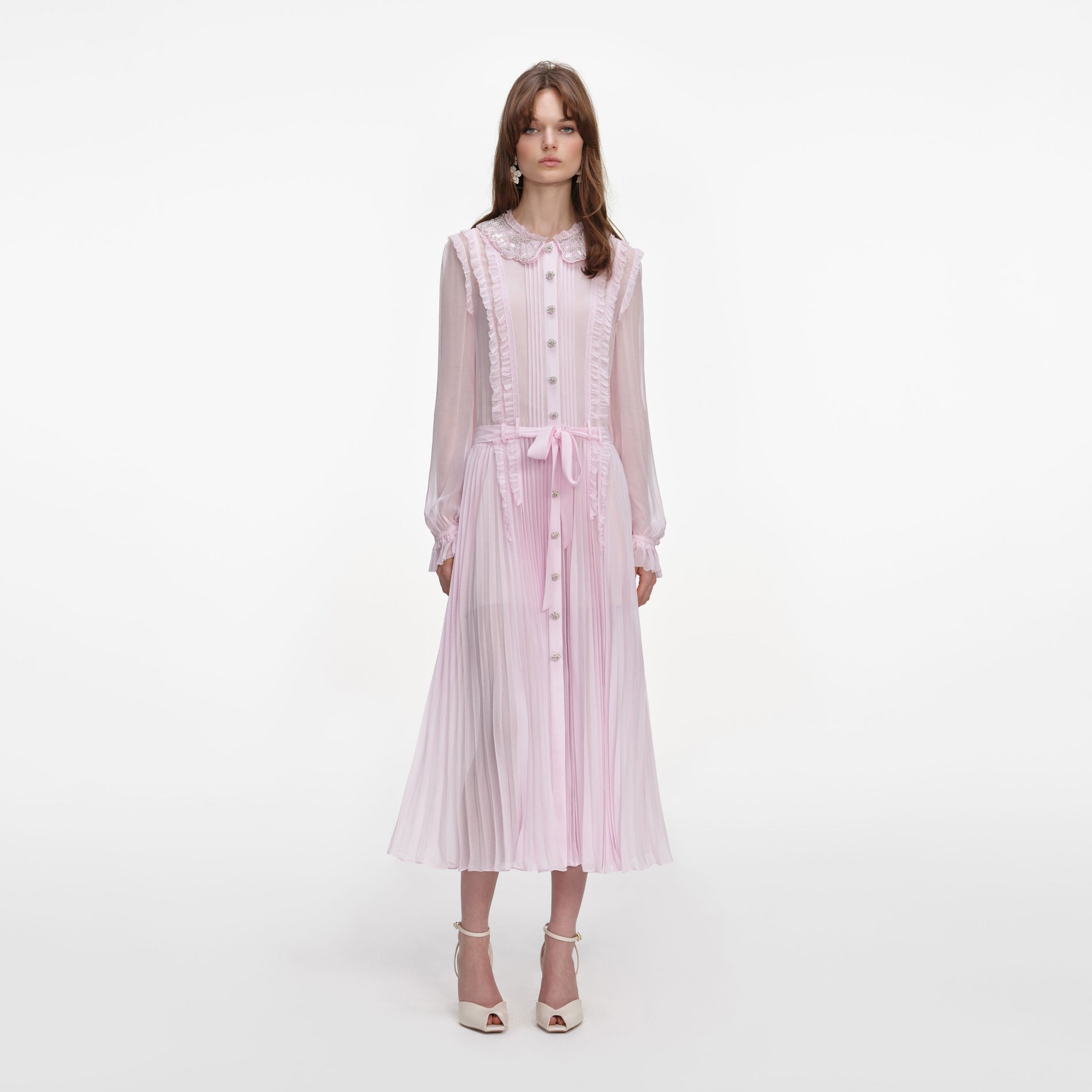 Front view of a woman wearing the Pink Pleated Georgette Midi Dress