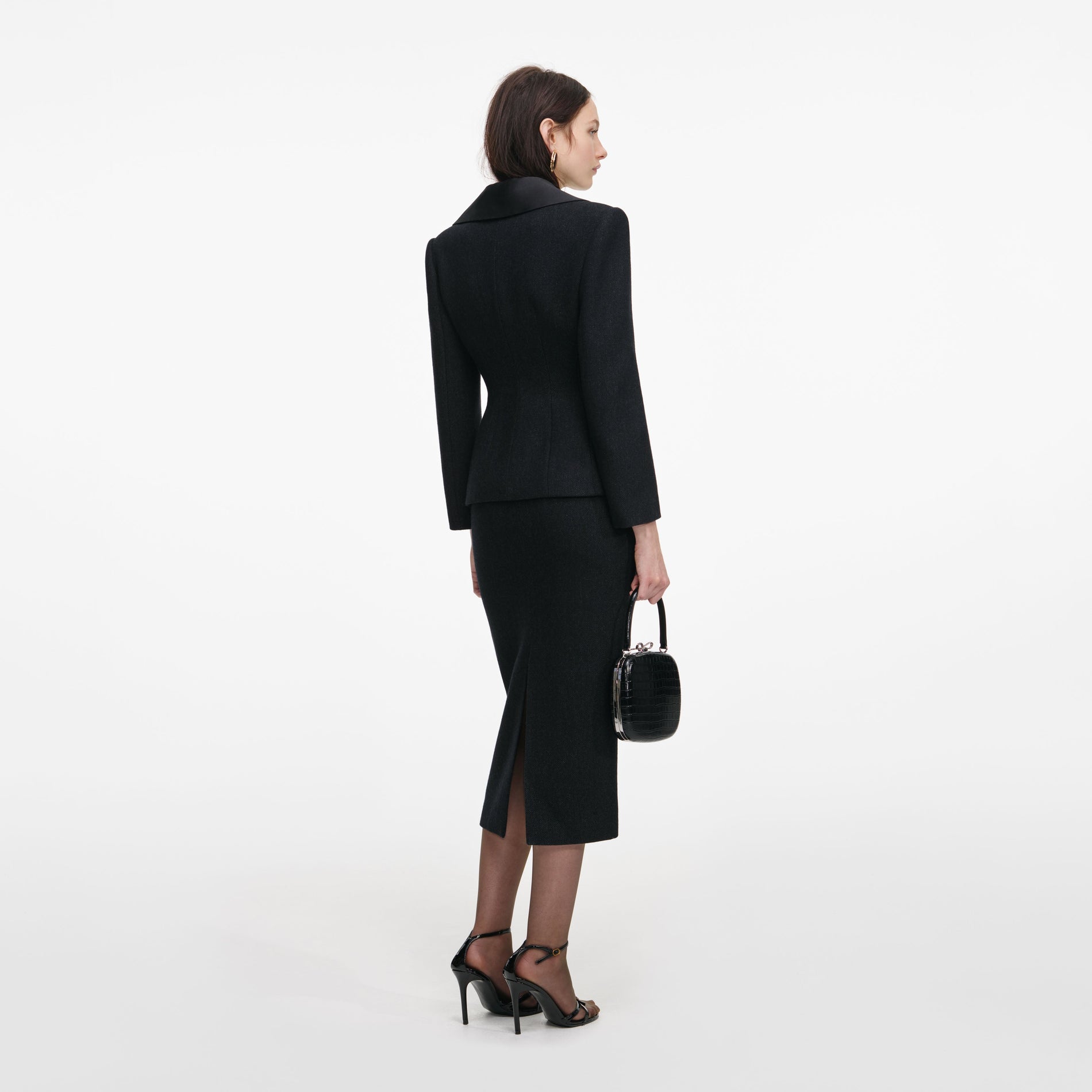 Back view of a woman wearing the Black Blazer Tailored Midi Dress