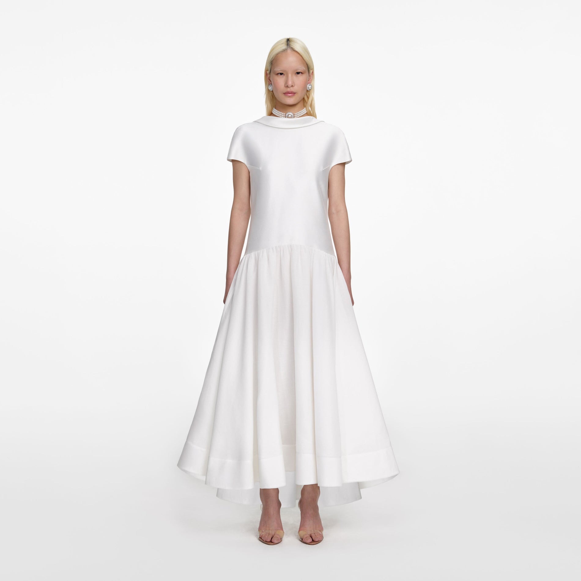 Front view of a woman wearing the White Satin Ramie Midi Dress
