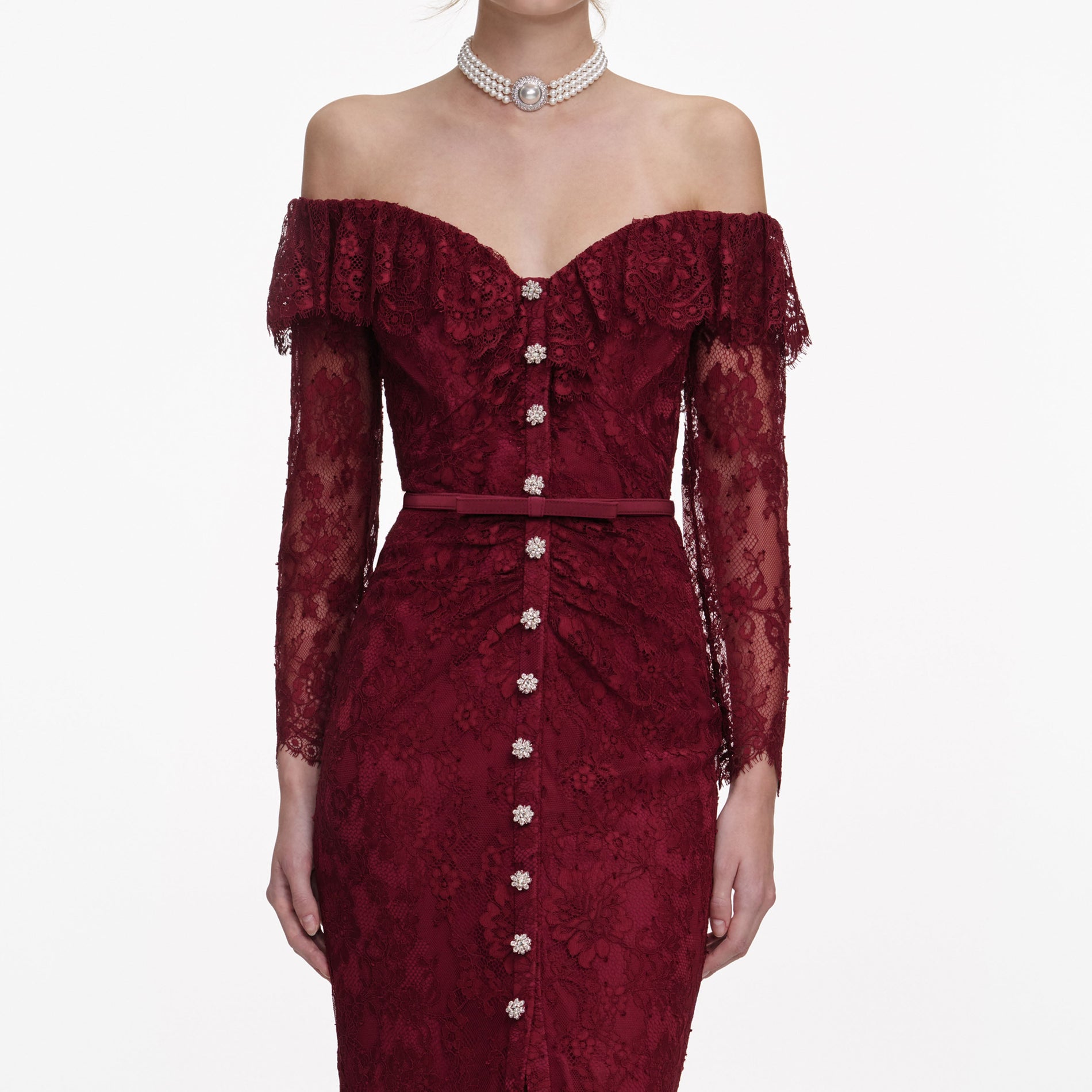 A close up of a woman wearing the Burgundy Off Shoulder Gathered Lace Maxi Dress