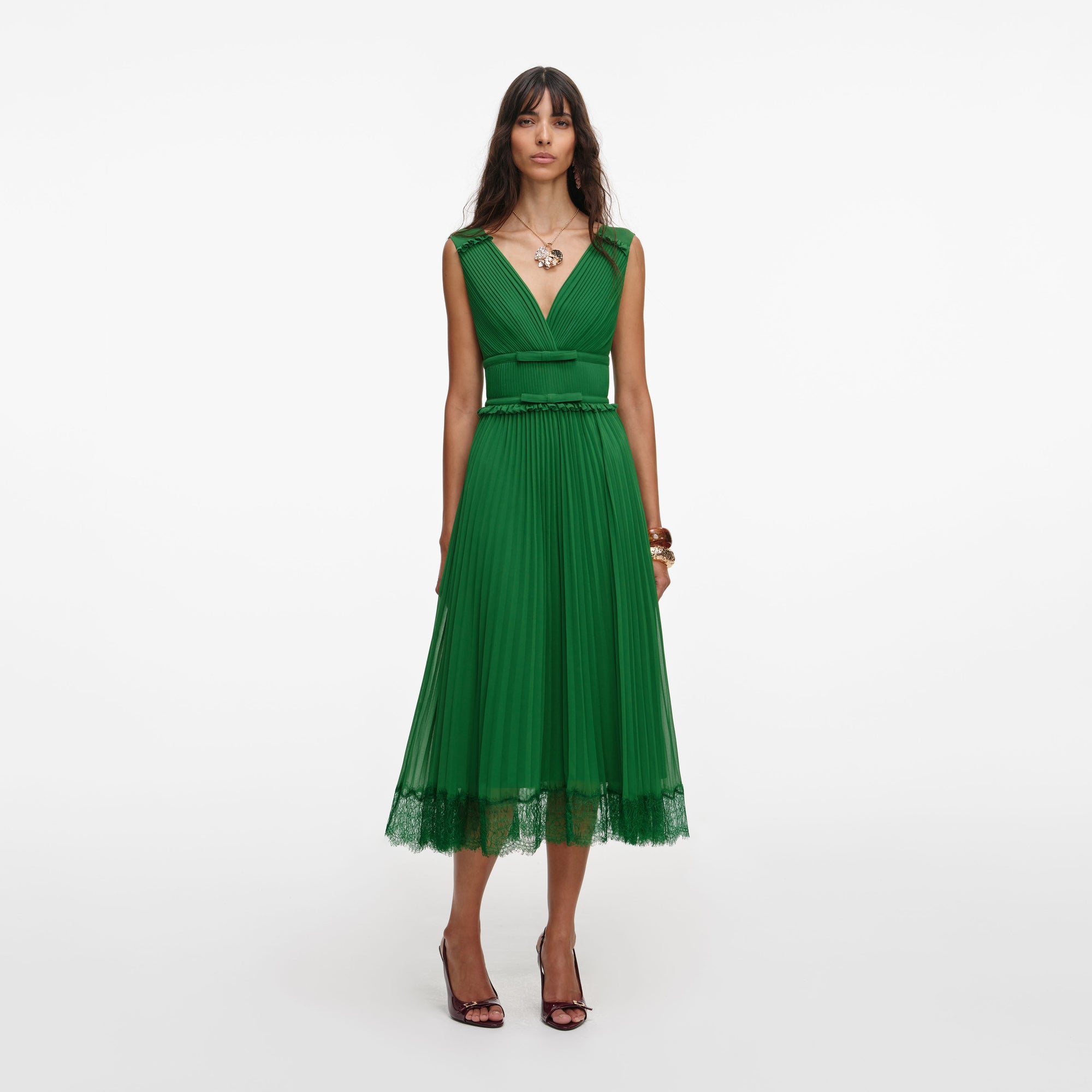 Front view of a woman wearing the Green Chiffon Midi Dress