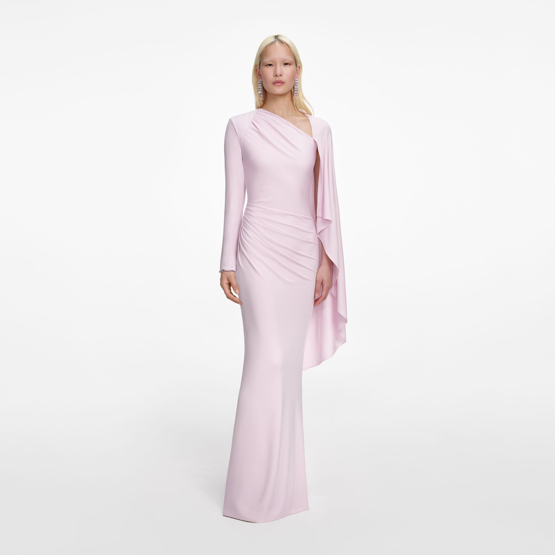 Front view of a woman wearing the Pink Jersey Drape Maxi Dress
