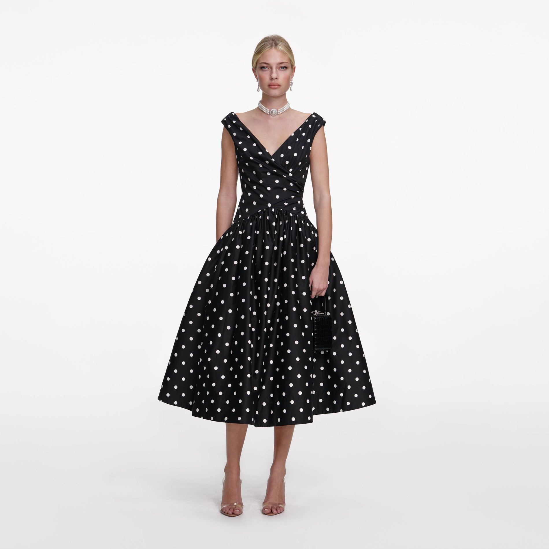 Front view of a woman wearing the Black Cotton Midi Dress