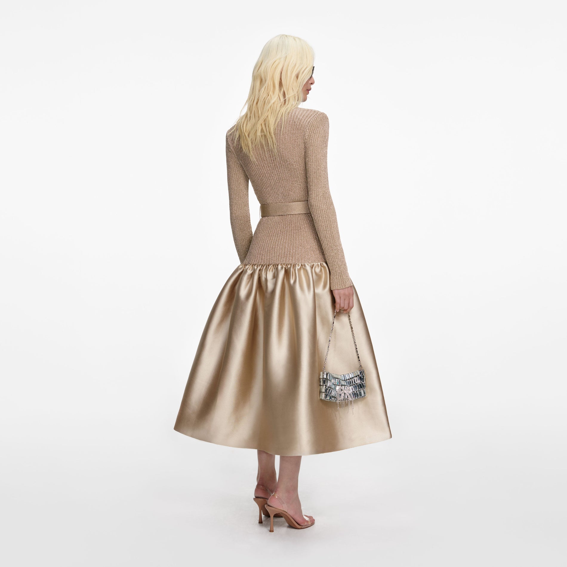 Back view of a woman wearing the Gold Knit Taffeta Midi Dress