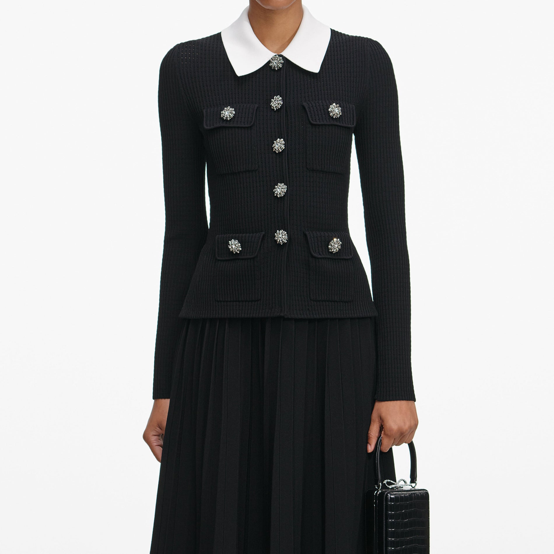 A close up of a woman wearing the Black Tailored Knit Midi Dress