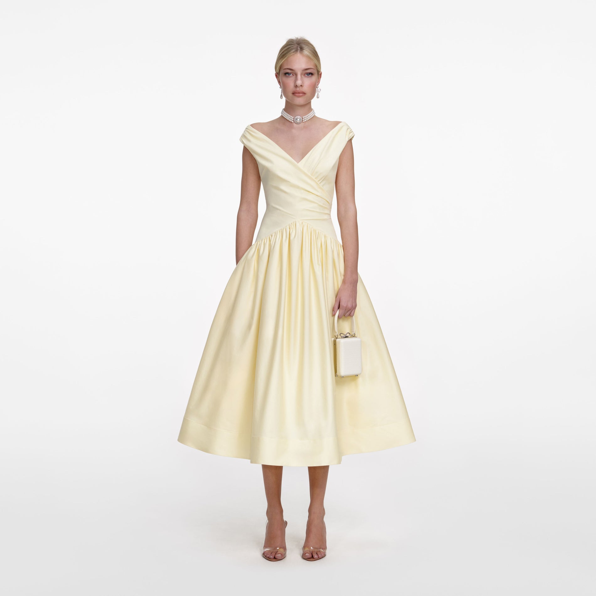 Front view of a woman wearing the Yellow Cotton Midi Dress