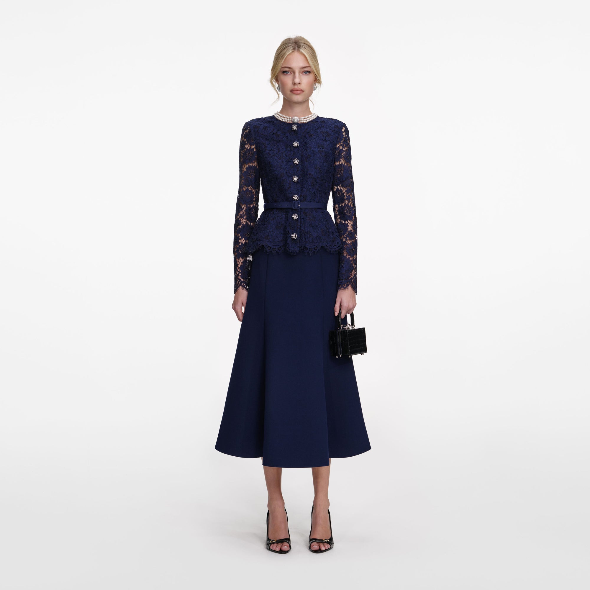 Front view of a woman wearing the Navy Tailored Lace Midi Dress