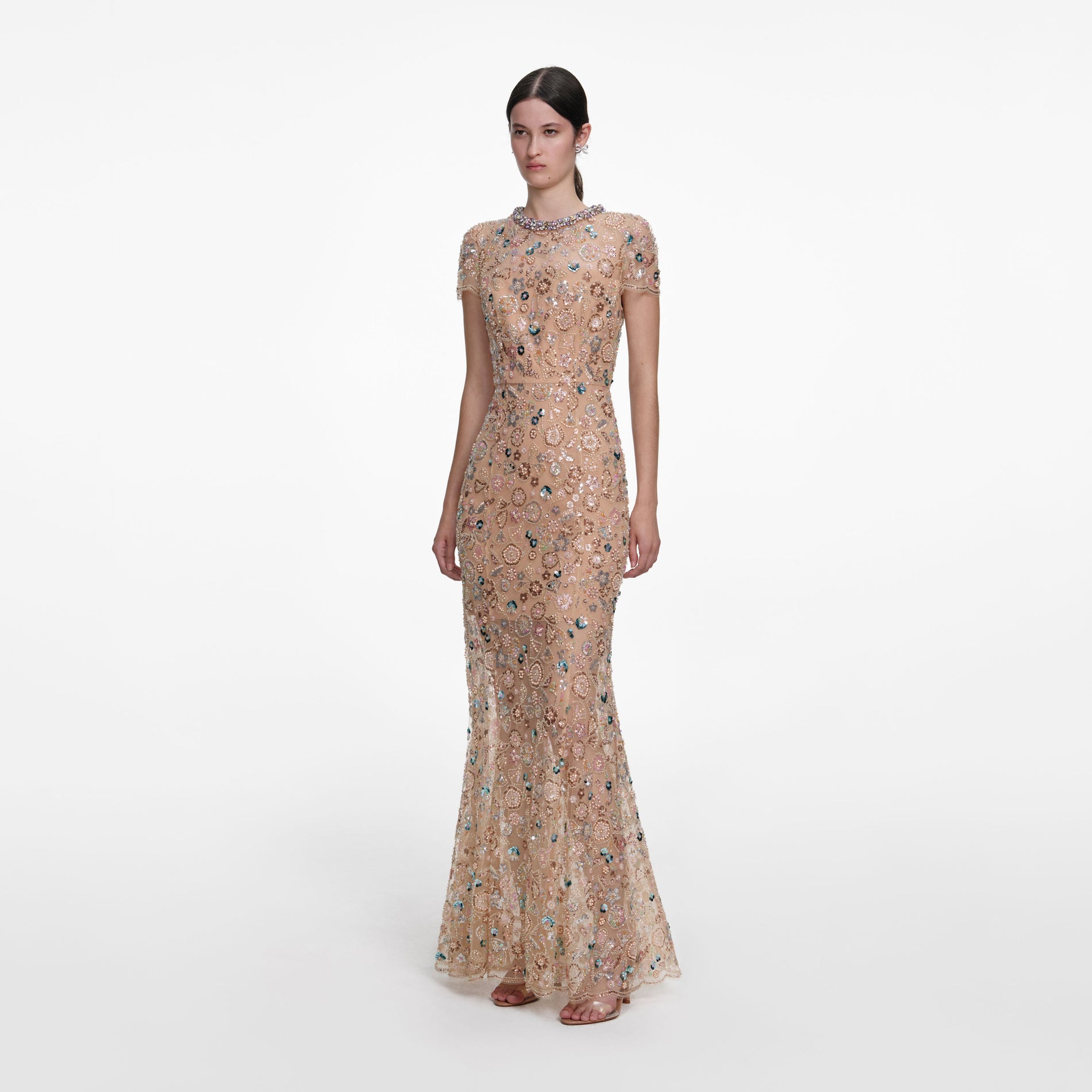 Side view of a woman wearing the Champagne Sequin Embroidered Maxi Dress