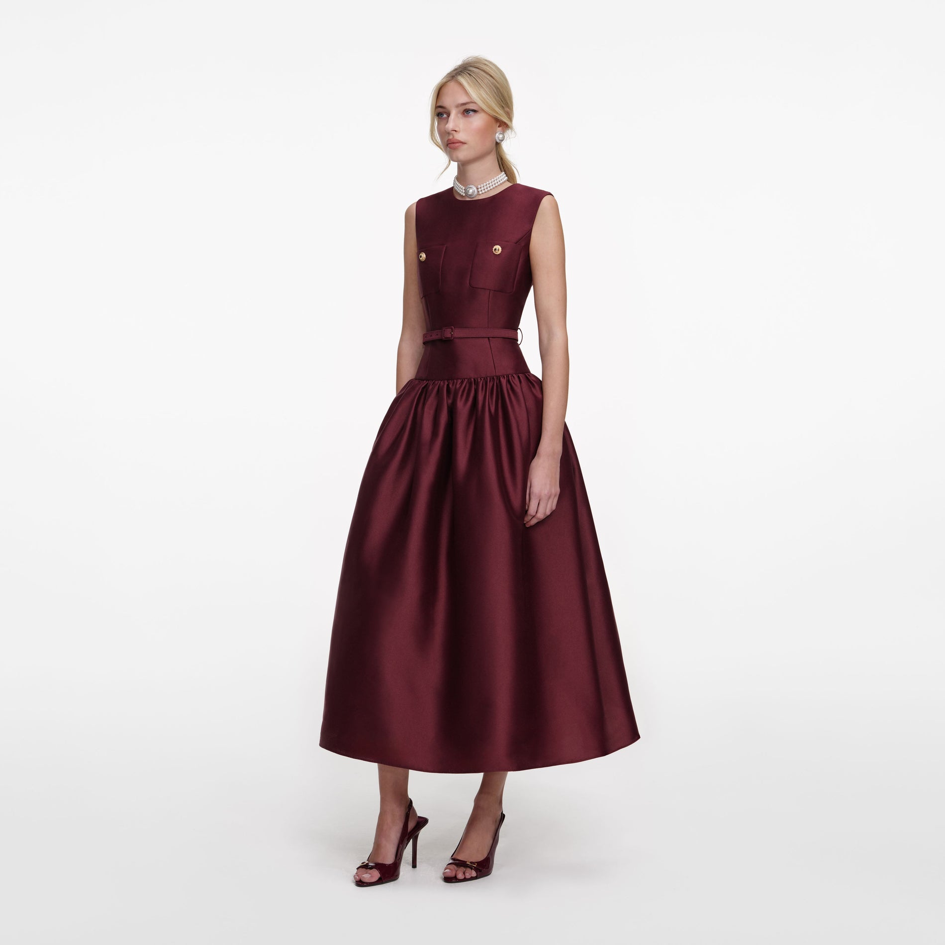 Side view of a woman wearing the Burgundy Taffeta Midi Dress