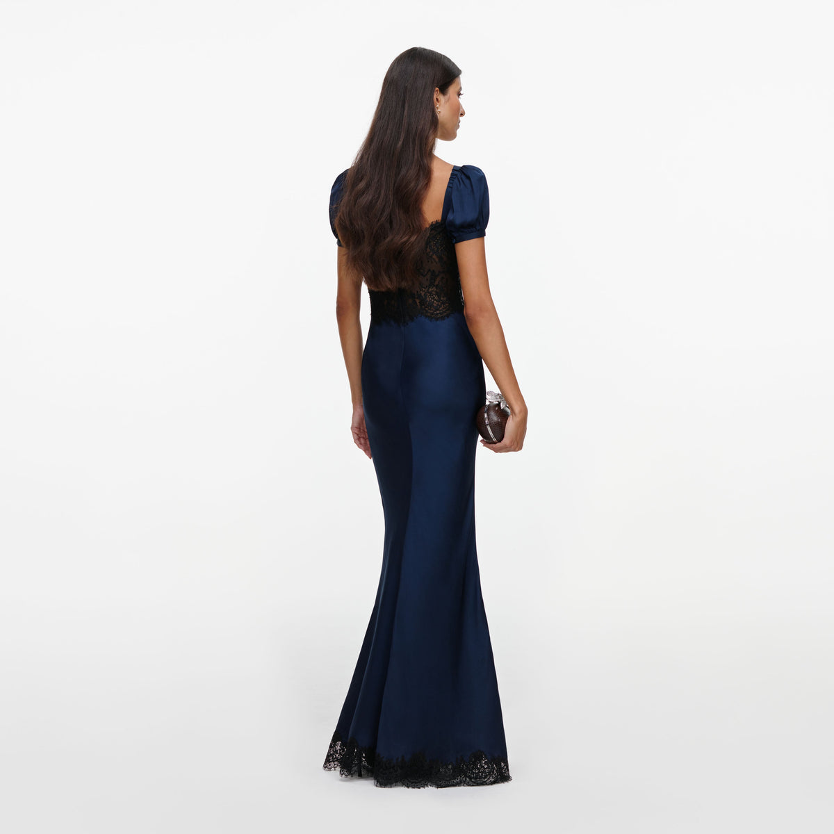 Back view of a woman wearing the Navy Viscose Lace Maxi Dress