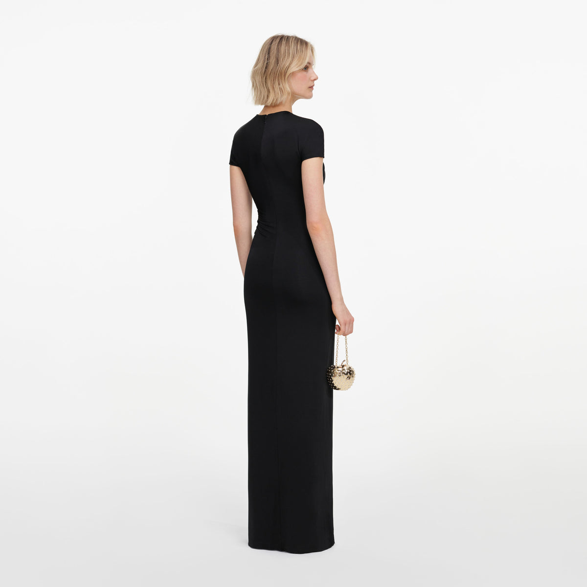 Back view of a woman wearing the Black Jersey Draped Maxi Dress