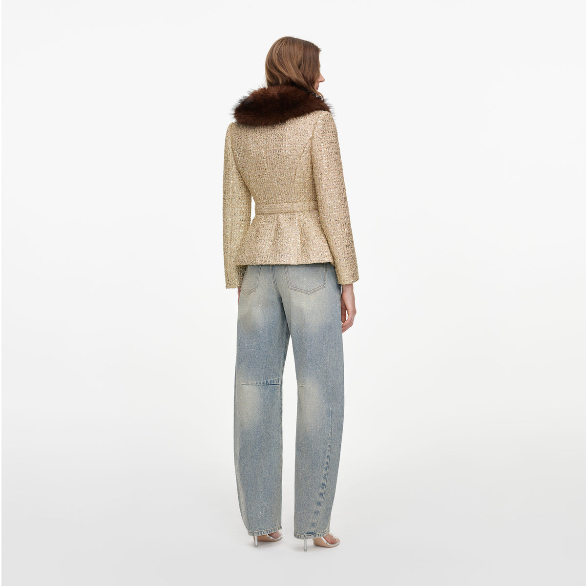 Back view of a woman wearing the Gold Sequin Boucle Fur Collar Jacket