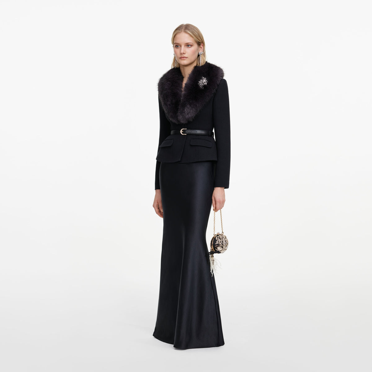 Side view of a woman wearing the Black Tailored Fur Collar Maxi Dress