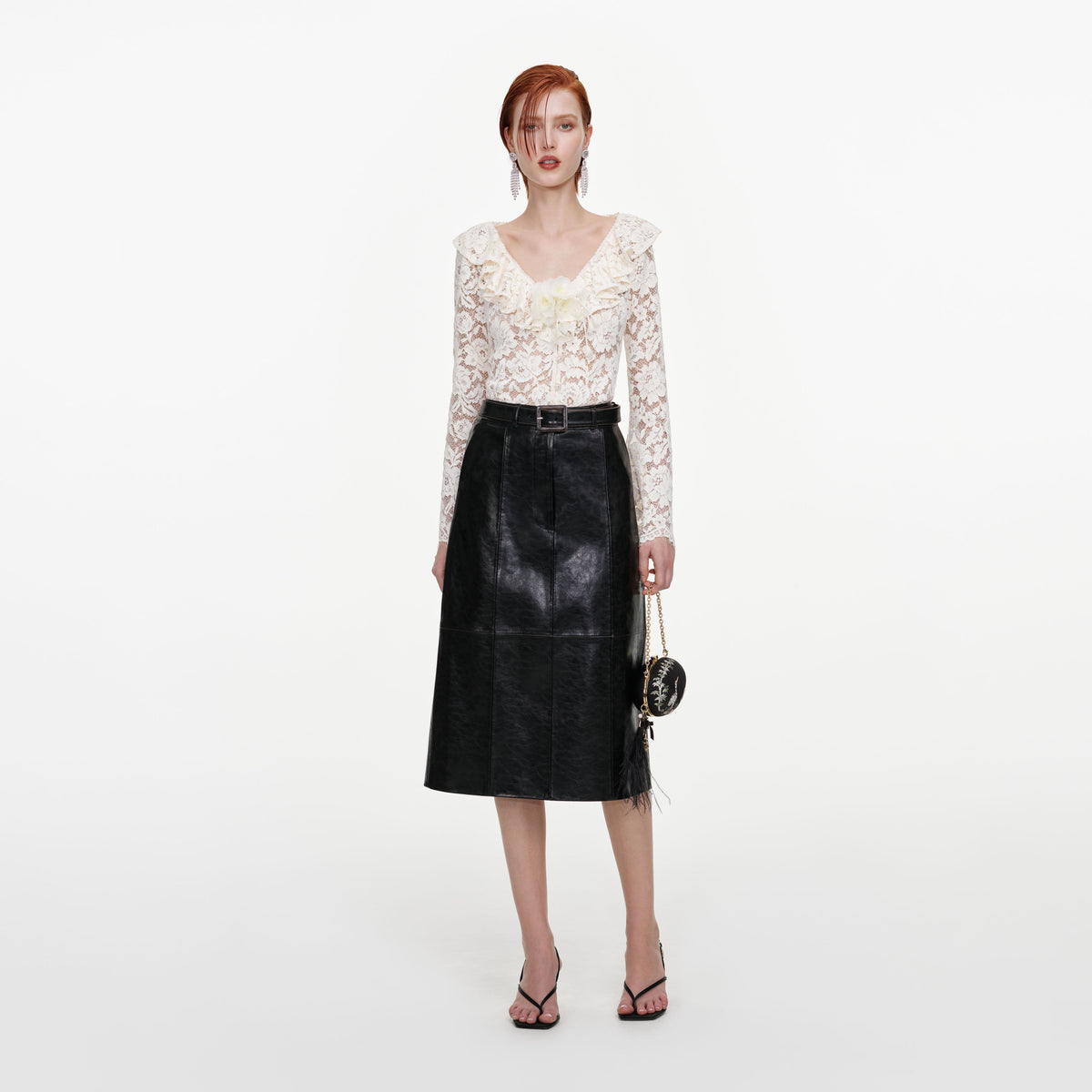 Front view of a woman wearing the Cream Lace Frill Top