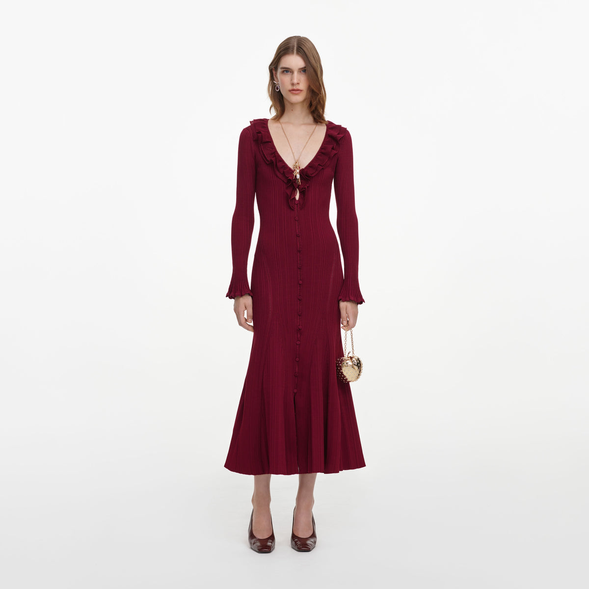 Front view of a woman wearing the Burgundy Ruffle Knit Midi Dress